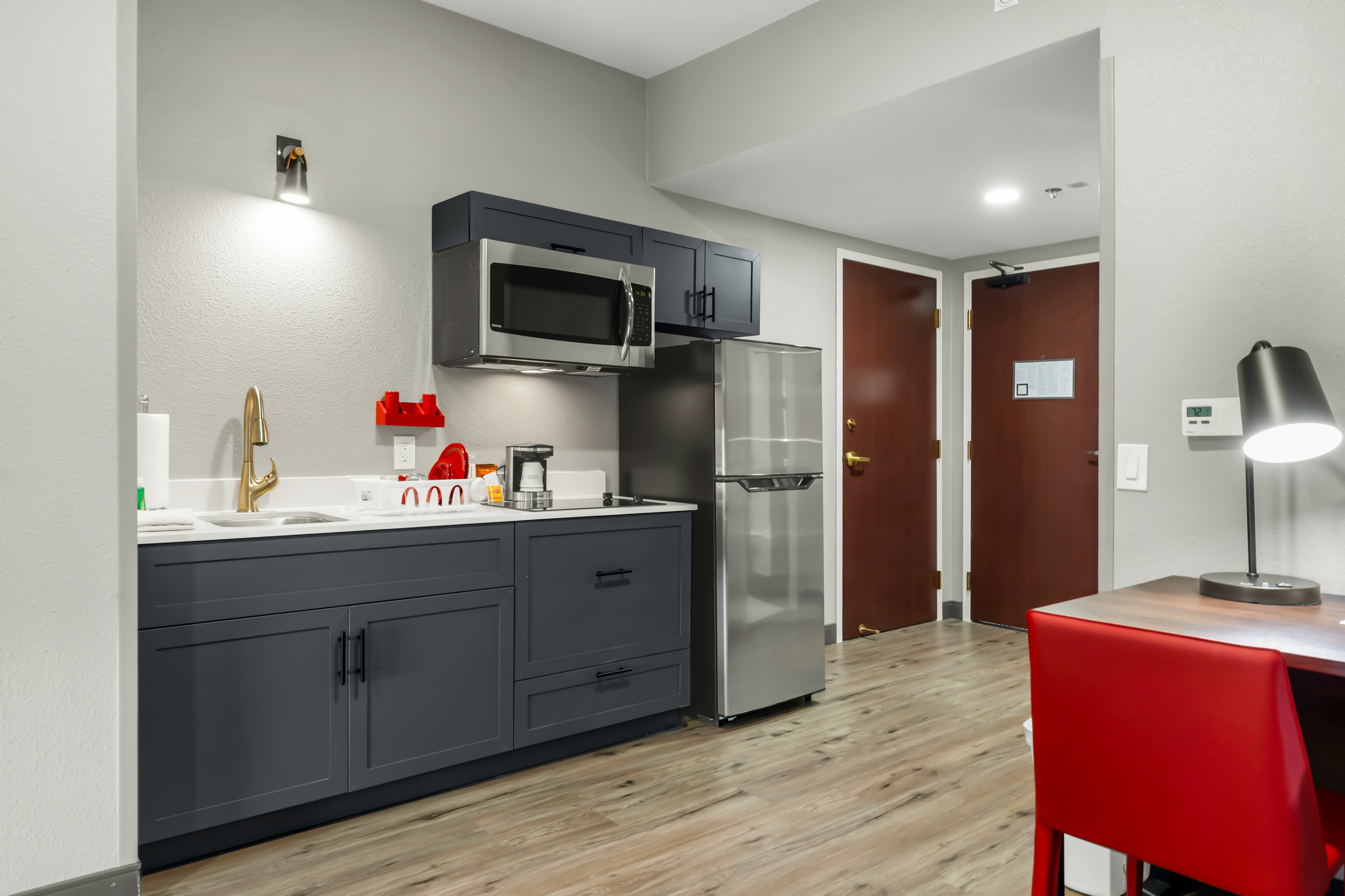 Guest room at the Hawthorn Extended Stay by Wyndham College Station in College Station, Texas