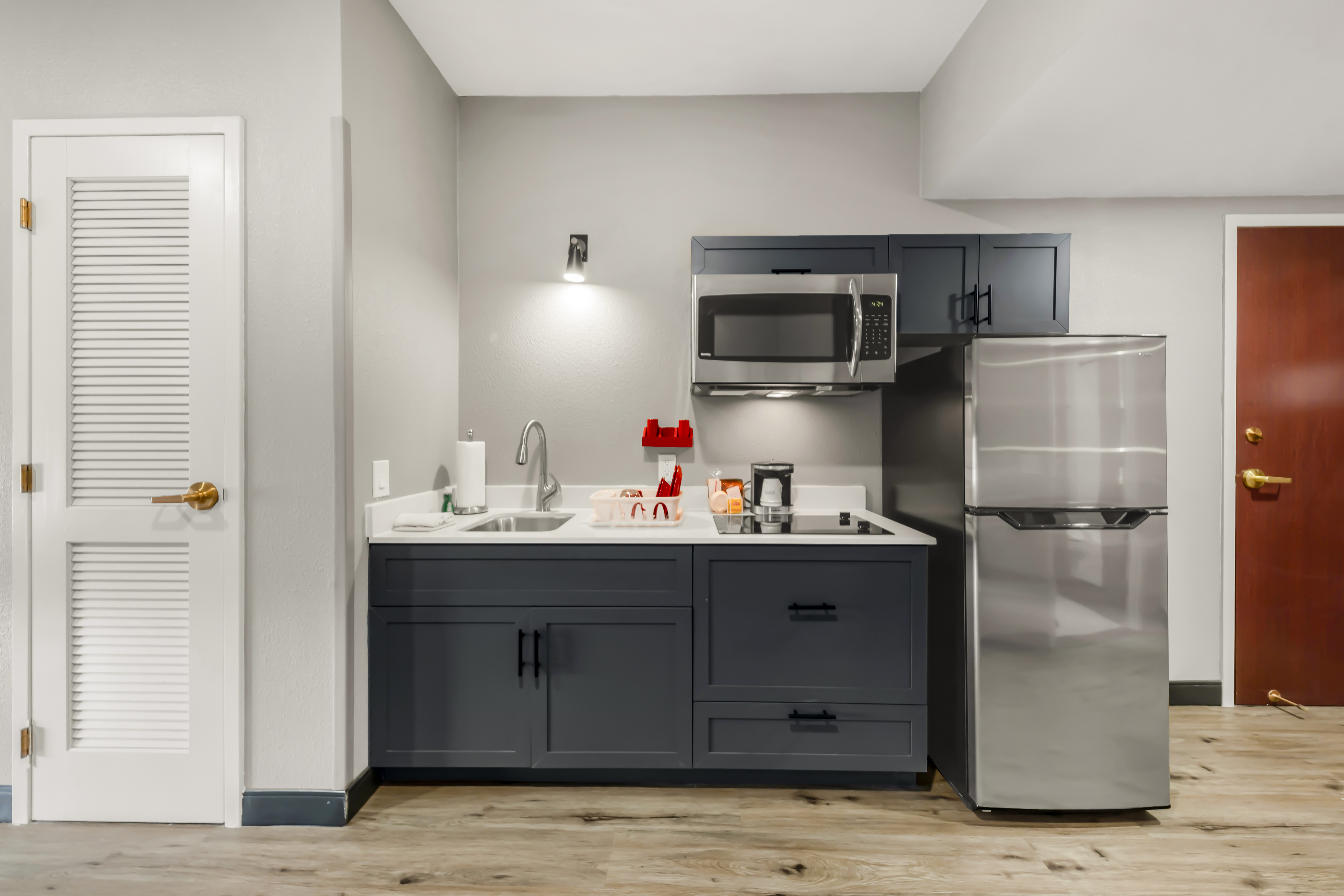 Guest room at the Hawthorn Extended Stay by Wyndham College Station in College Station, Texas
