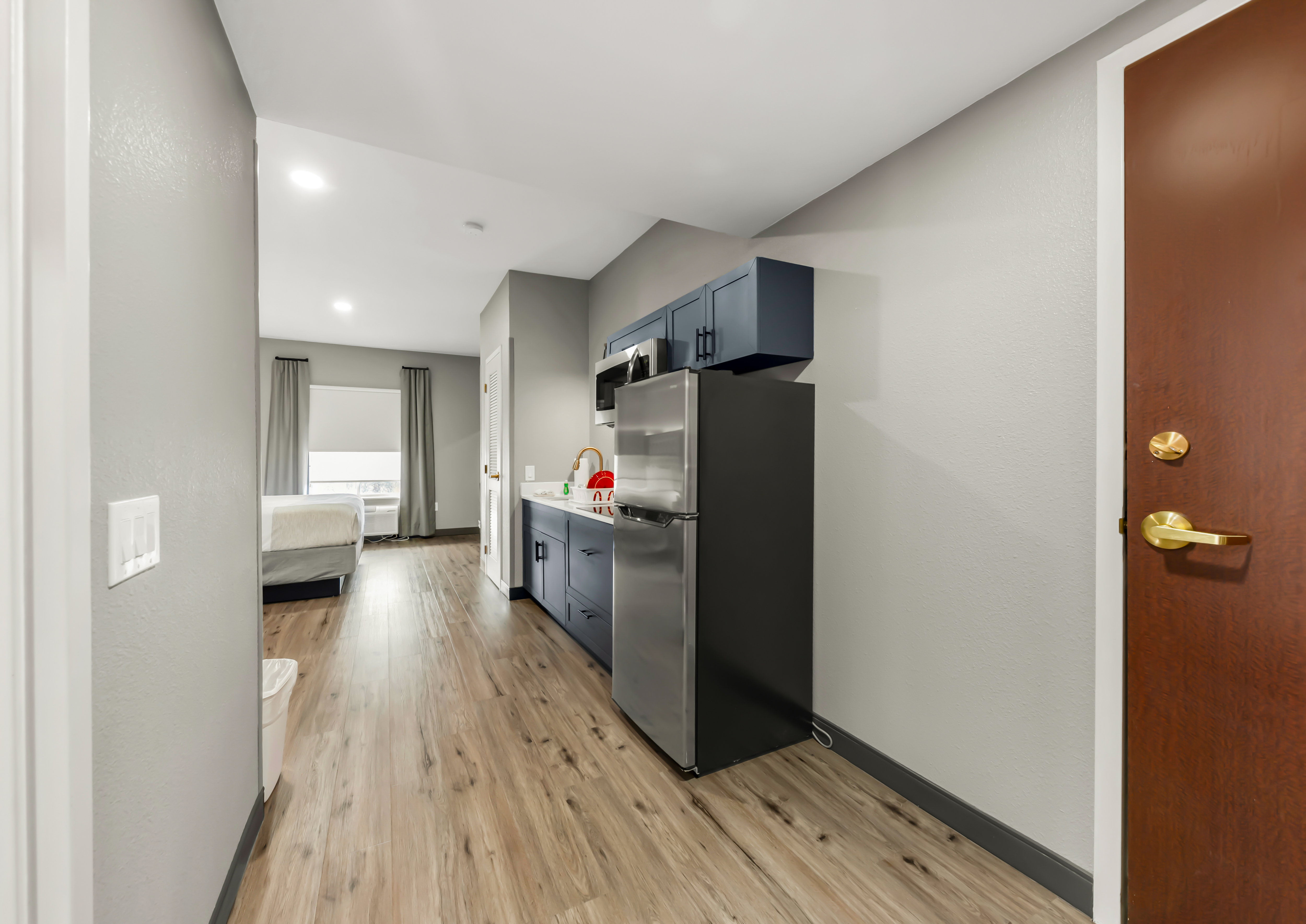 Guest room at the Hawthorn Extended Stay by Wyndham College Station in College Station, Texas