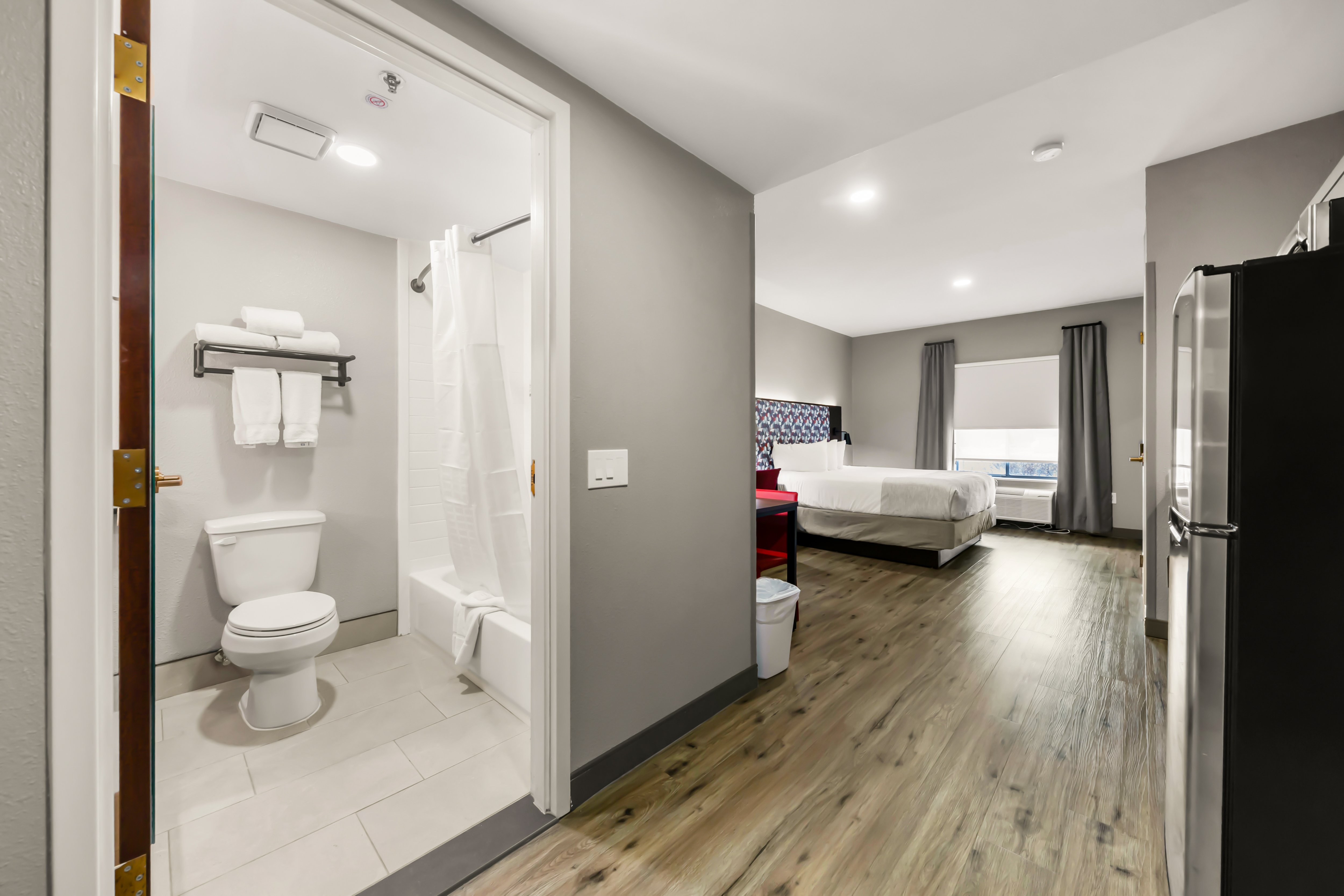 Guest room at the Hawthorn Extended Stay by Wyndham College Station in College Station, Texas