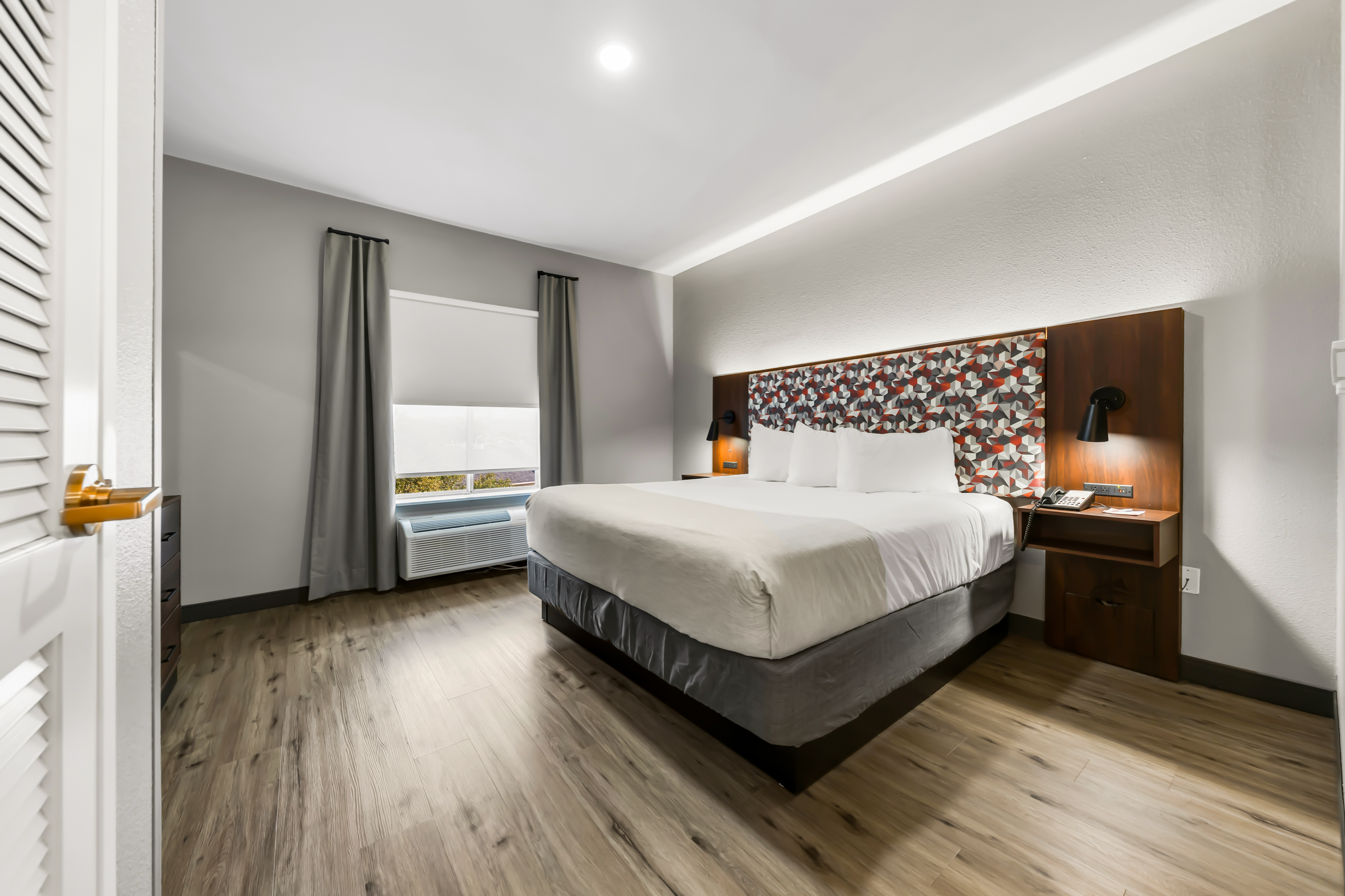 Guest room at the Hawthorn Extended Stay by Wyndham College Station in College Station, Texas