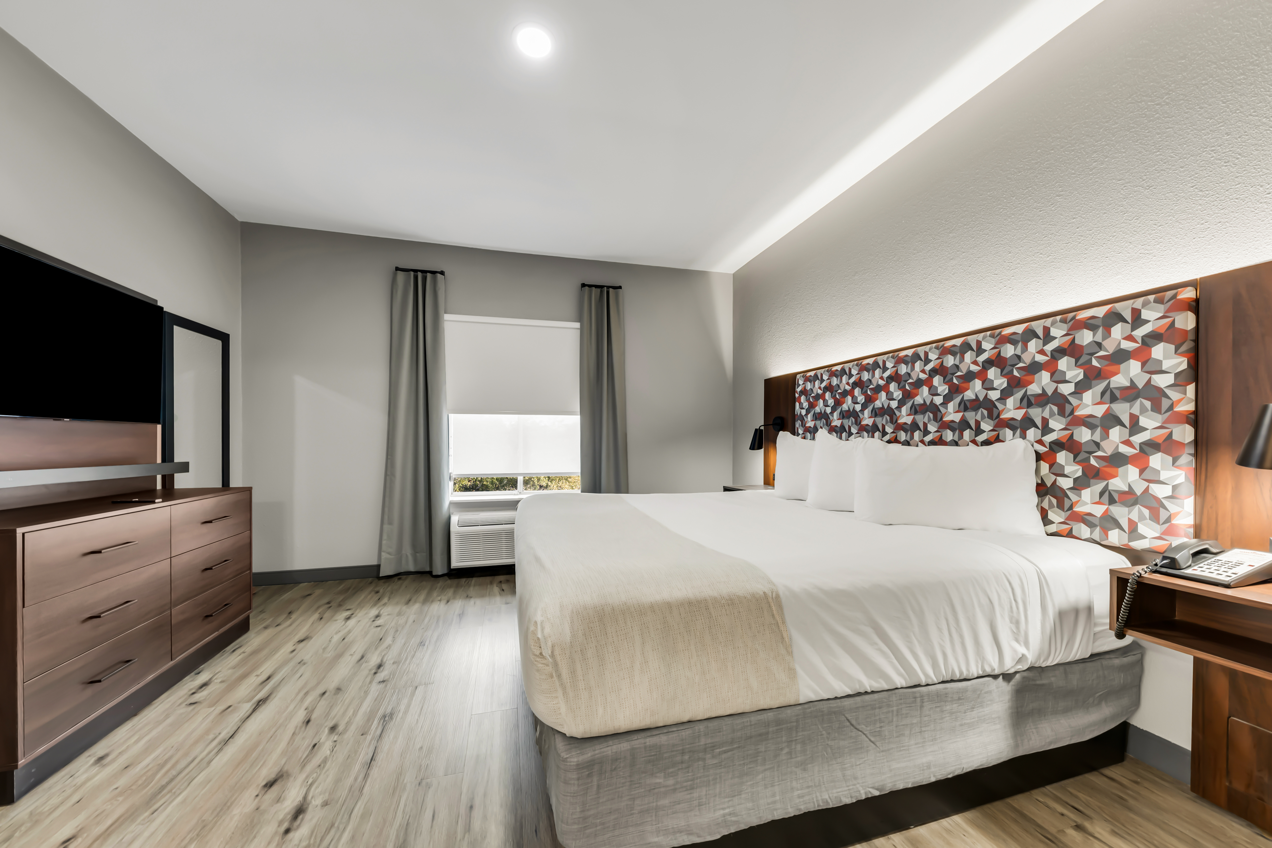 Guest room at the Hawthorn Extended Stay by Wyndham College Station in College Station, Texas