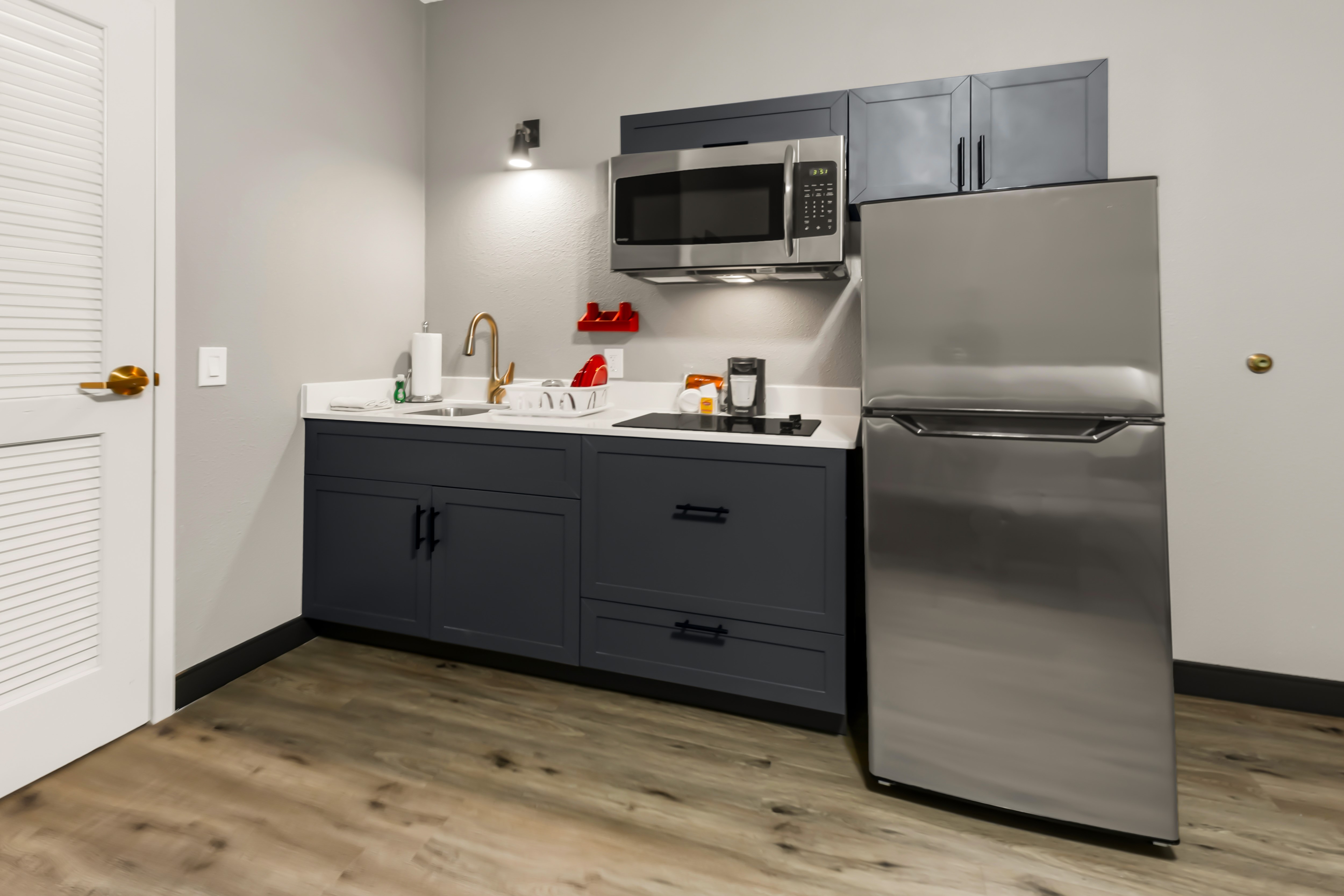 Guest room at the Hawthorn Extended Stay by Wyndham College Station in College Station, Texas