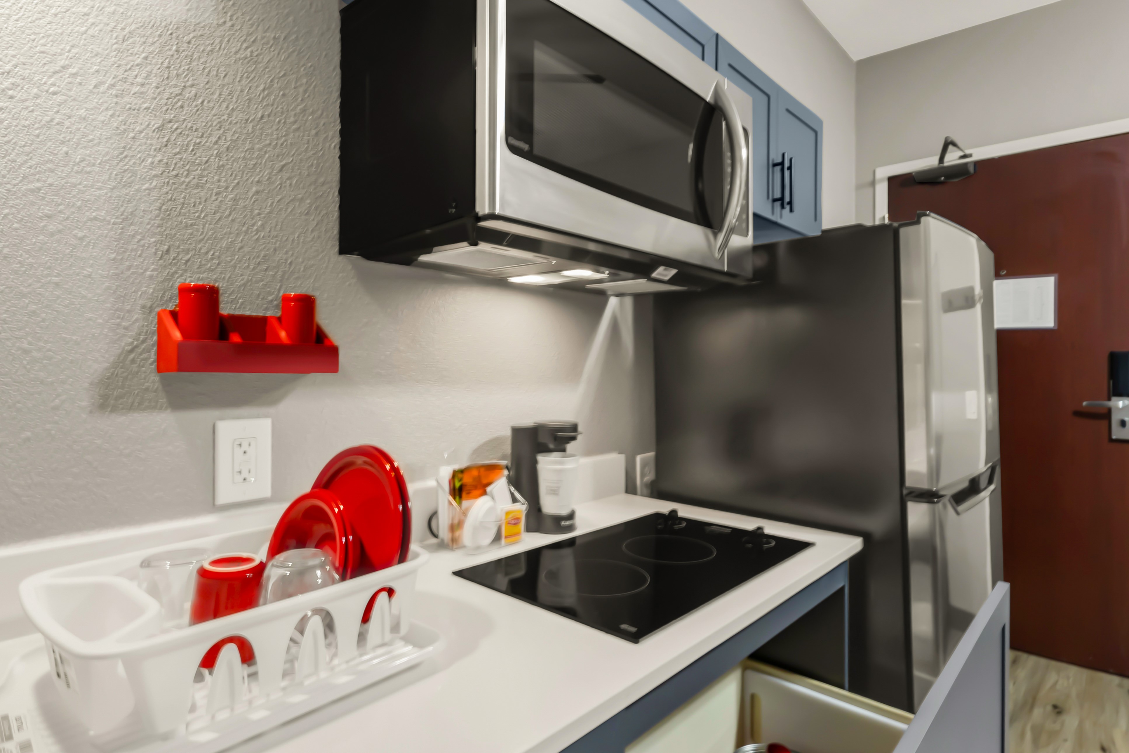 Guest room at the Hawthorn Extended Stay by Wyndham College Station in College Station, Texas