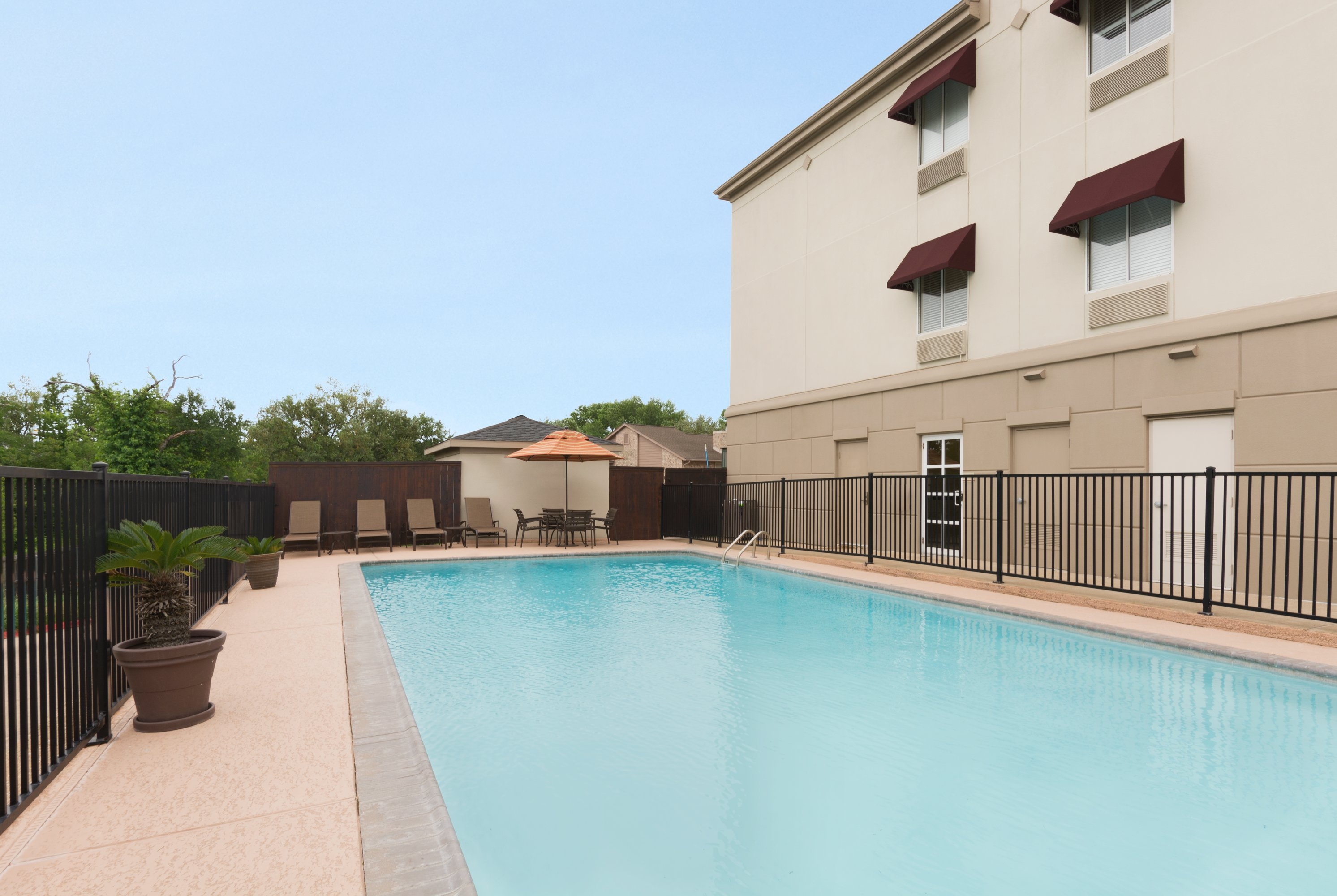 Pool at the Hawthorn Extended Stay by Wyndham College Station in College Station, Texas