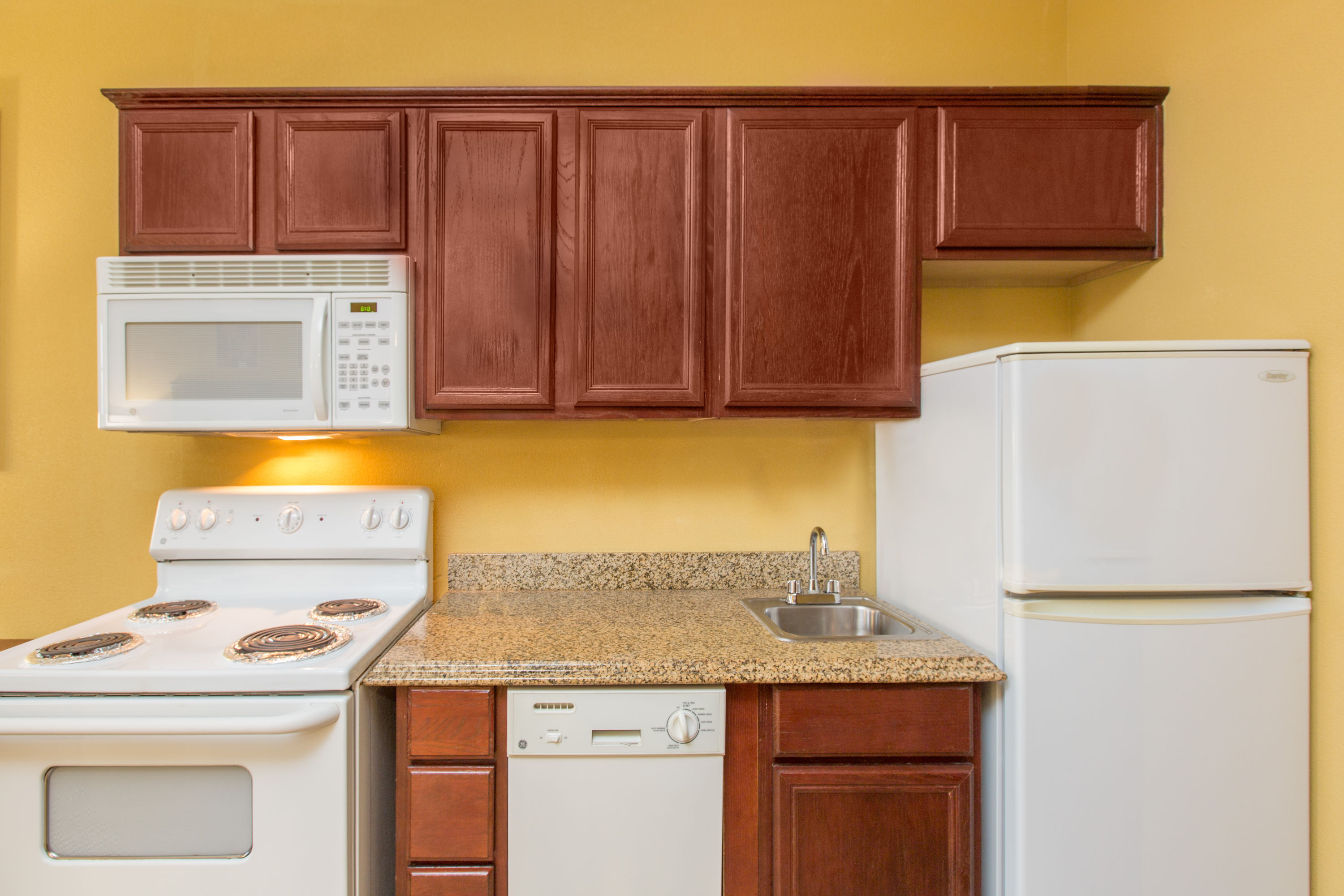 Guest room kitchen at Hawthorn Extended Stay by Wyndham Corpus Christi Padre Is in Corpus Christi, Texas