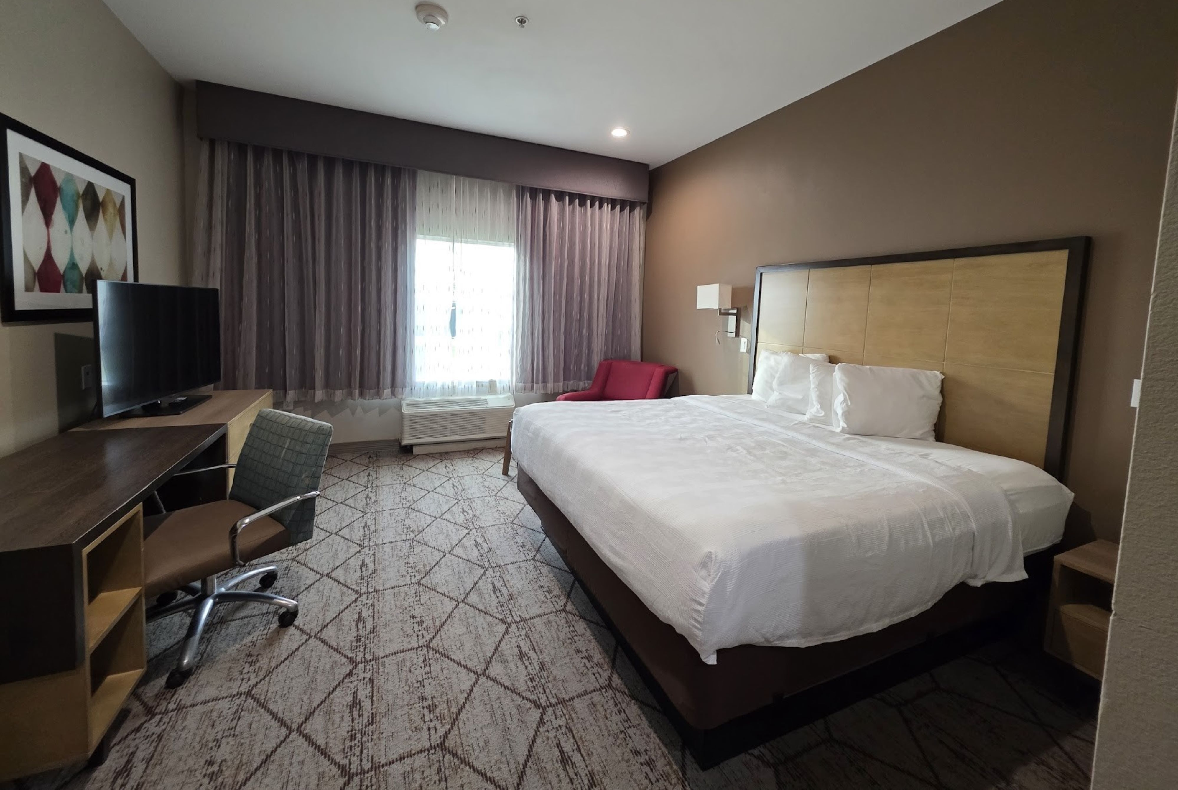 Guest room at the Hawthorn Extended Stay by Wyndham Corpus Christi I-37 NW in Corpus Christi, Texas