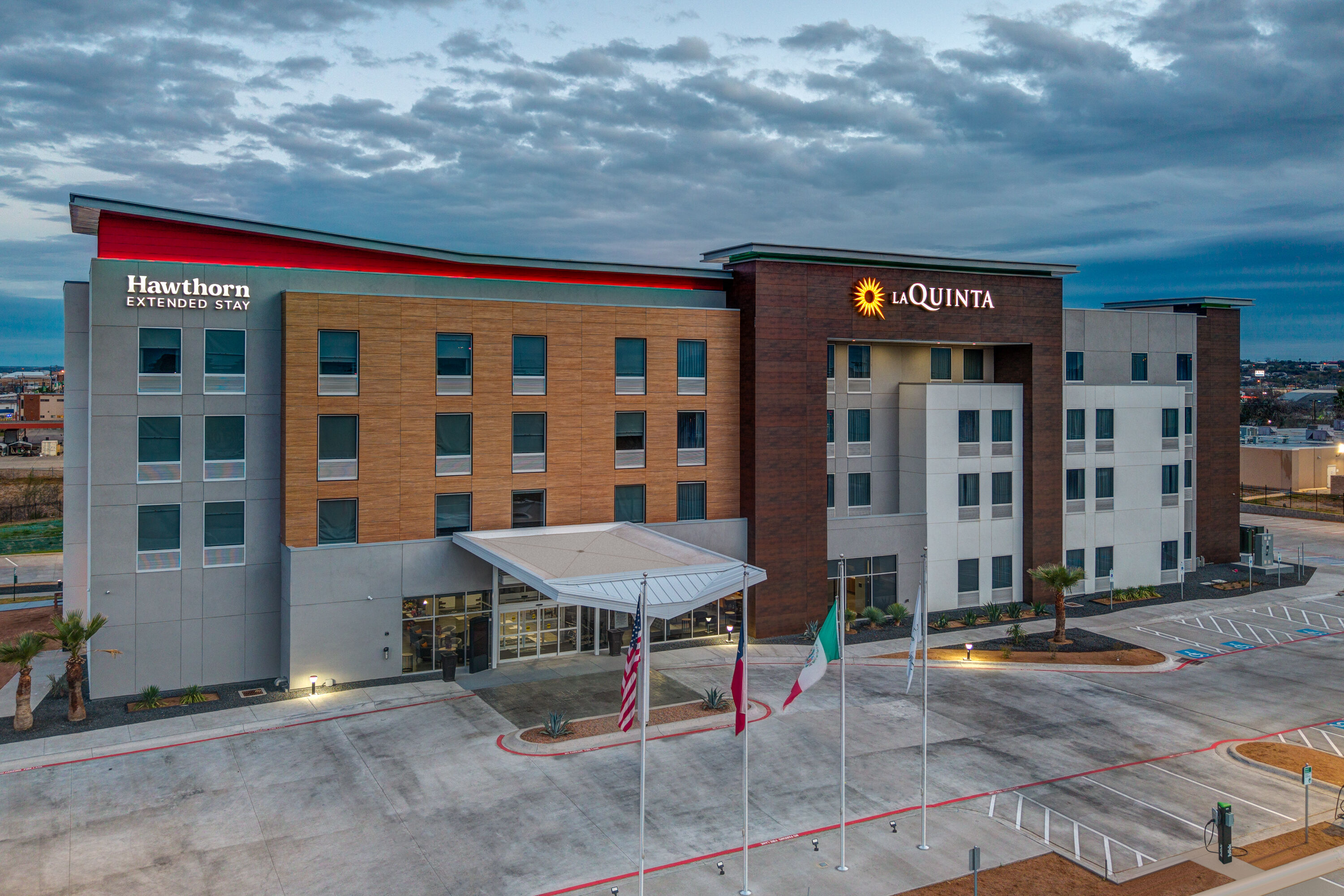 Exterior Dusk Image of Hawthorn Extended Stay by Wyndham Eagle Pass hotel in Eagle Pass, Texas