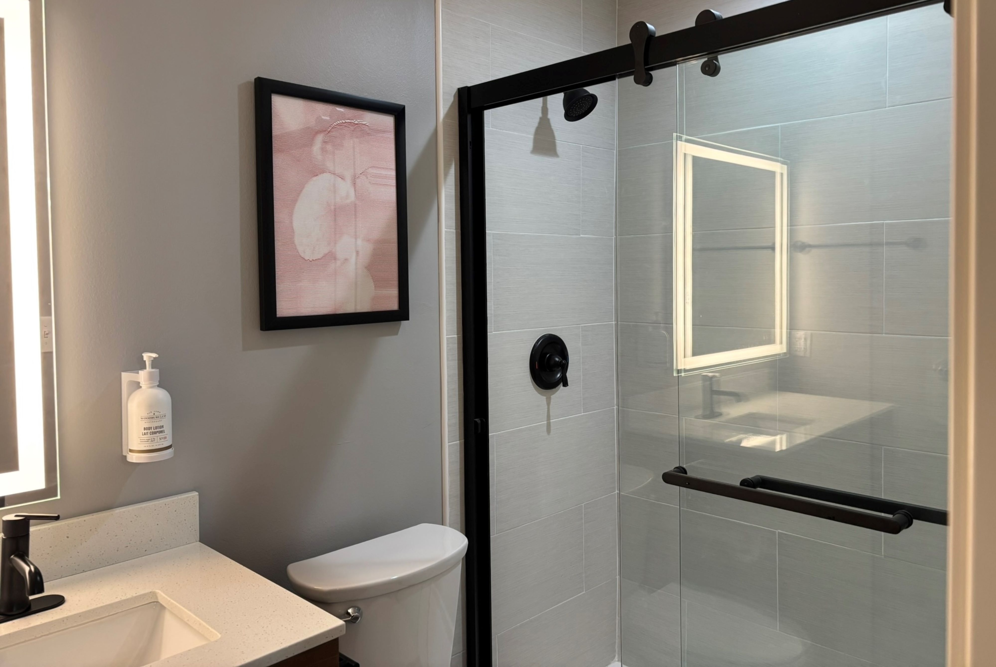 Guest room bath at the Hawthorn Extended Stay by Wyndham Eagle Pass in Eagle Pass, Texas