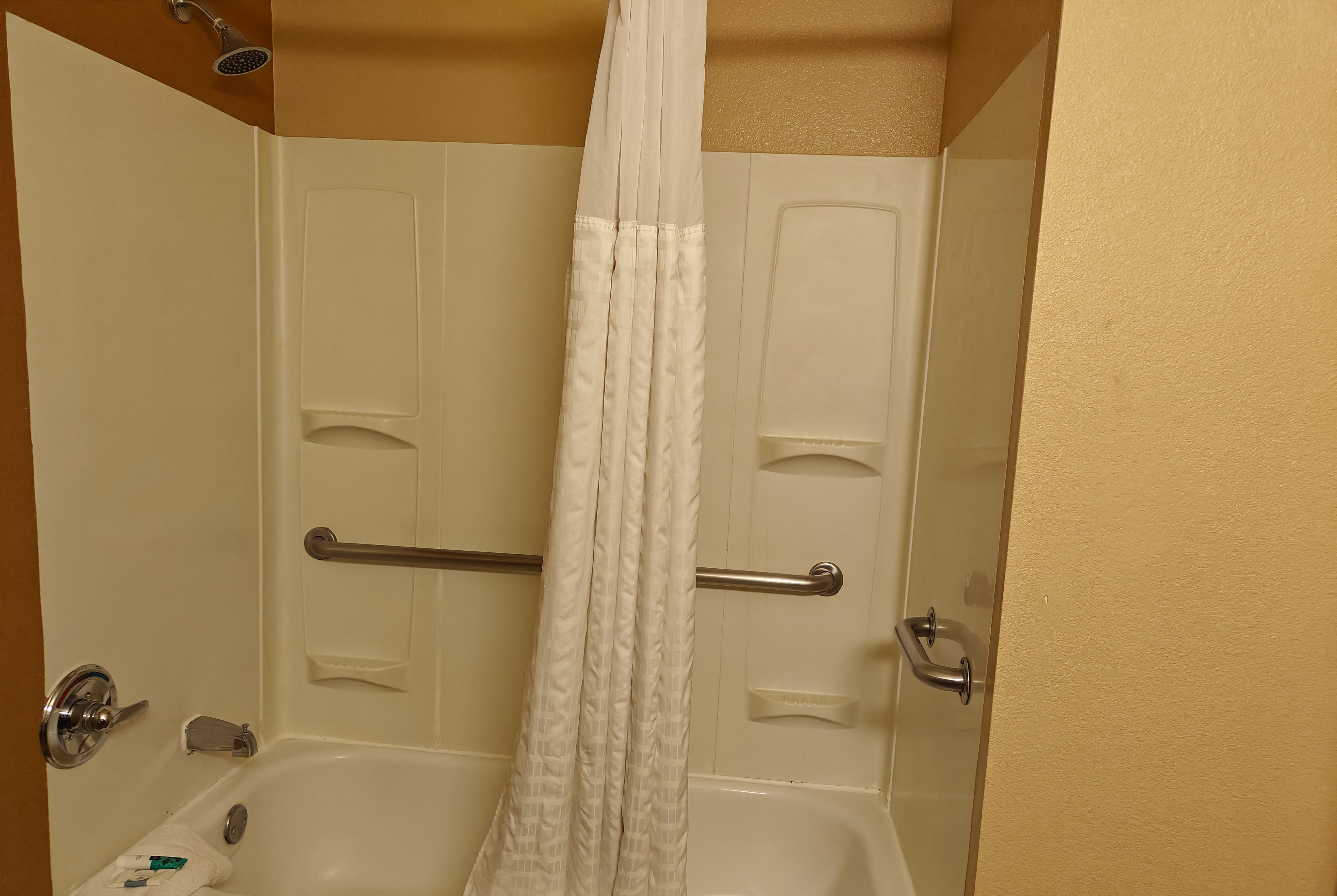 Guest room bath at the Hawthorn Extended Stay by Wyndham DFW Airport North in Irving, Texas