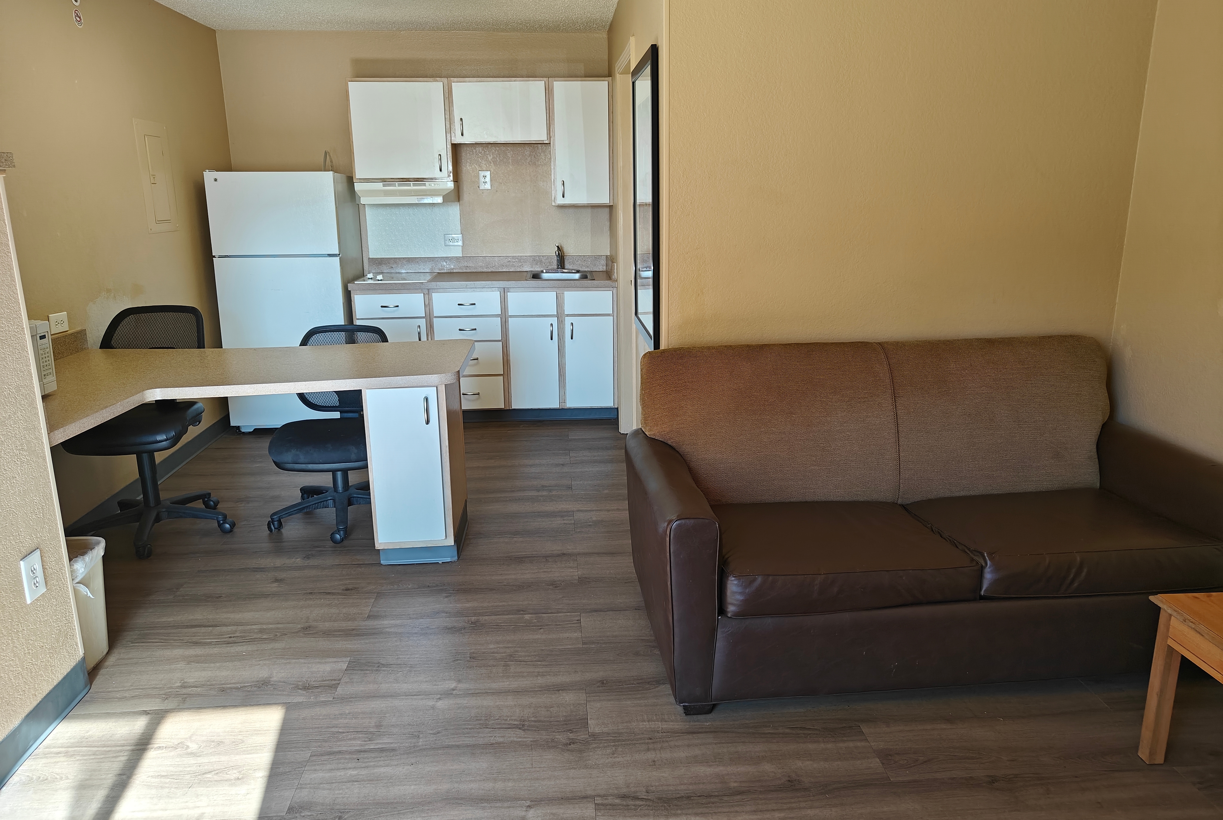 Guest room at the Hawthorn Extended Stay by Wyndham DFW Airport North in Irving, Texas