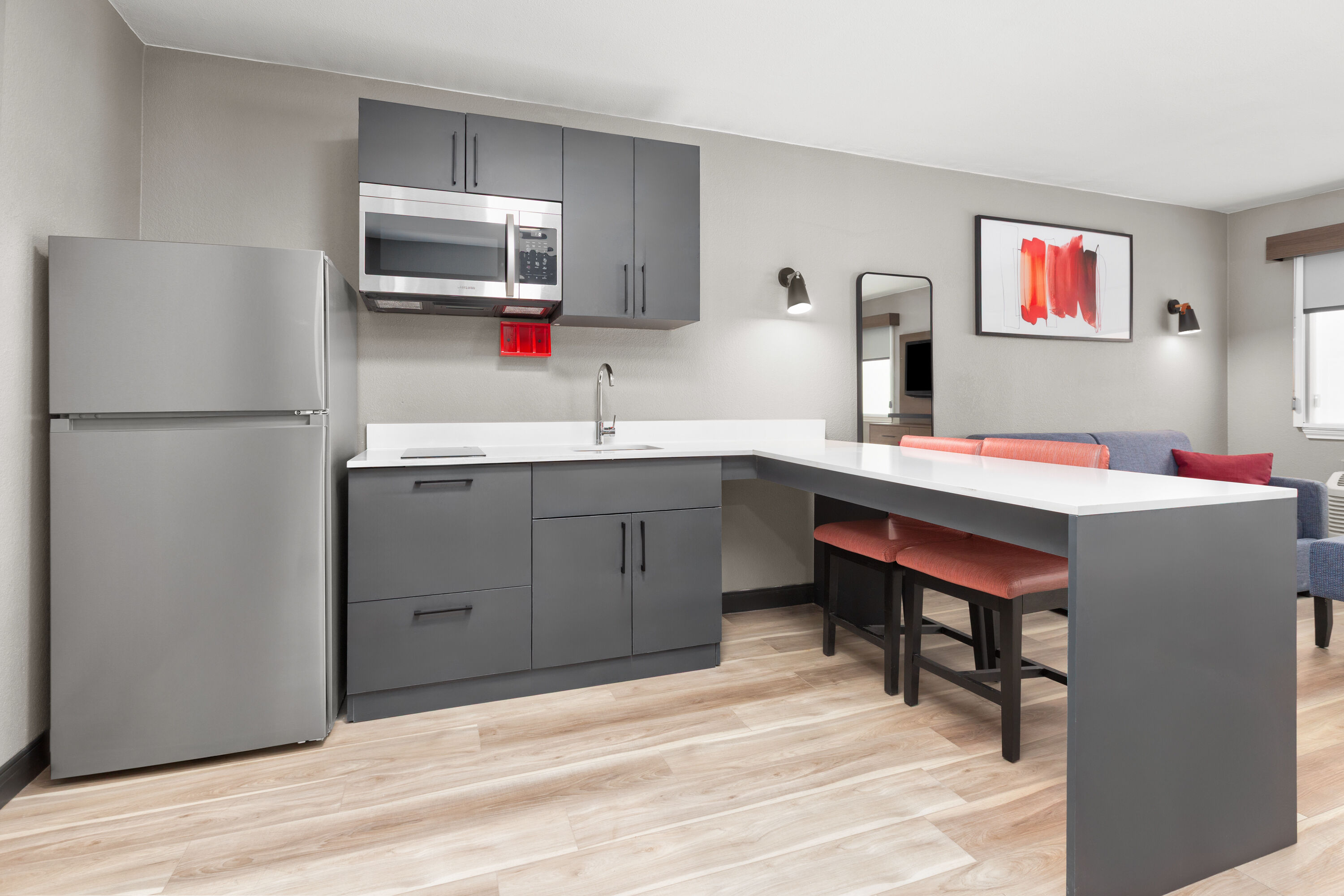 Guest room at the Hawthorn Extended Stay by Wyndham DFW Airport North in Irving, Texas
