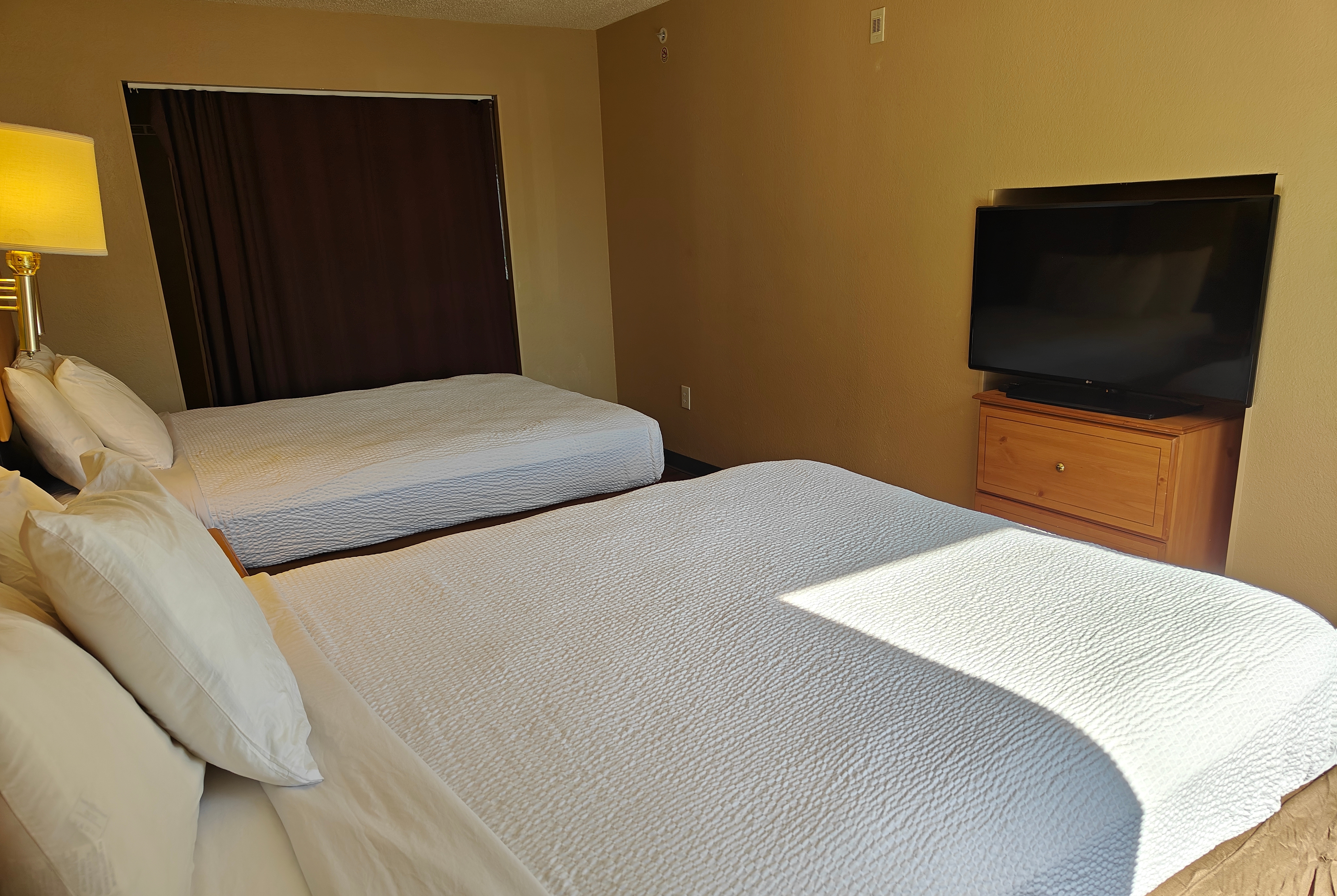 Guest room at the Hawthorn Extended Stay by Wyndham DFW Airport North in Irving, Texas