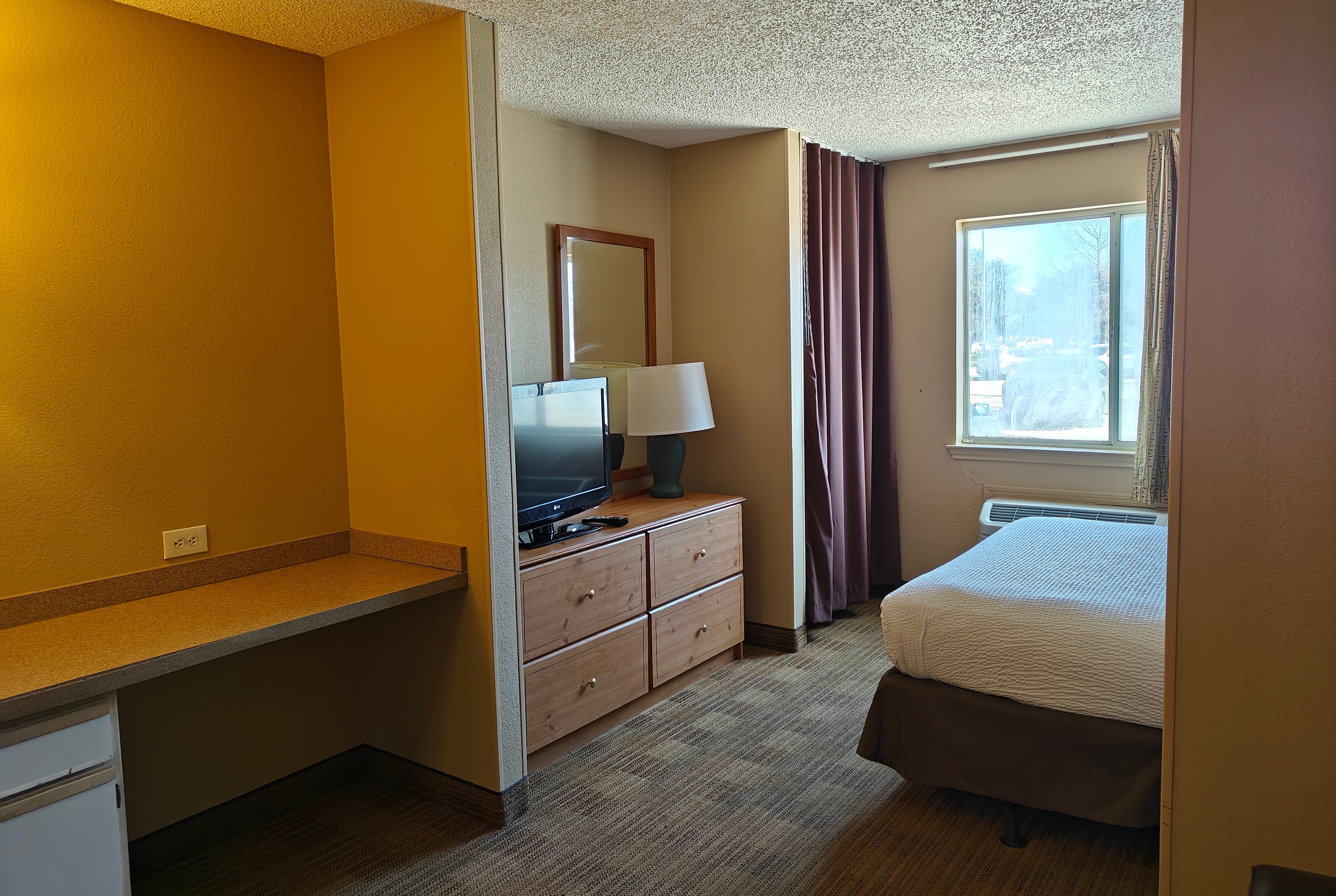 Guest room at the Hawthorn Extended Stay by Wyndham DFW Airport North in Irving, Texas