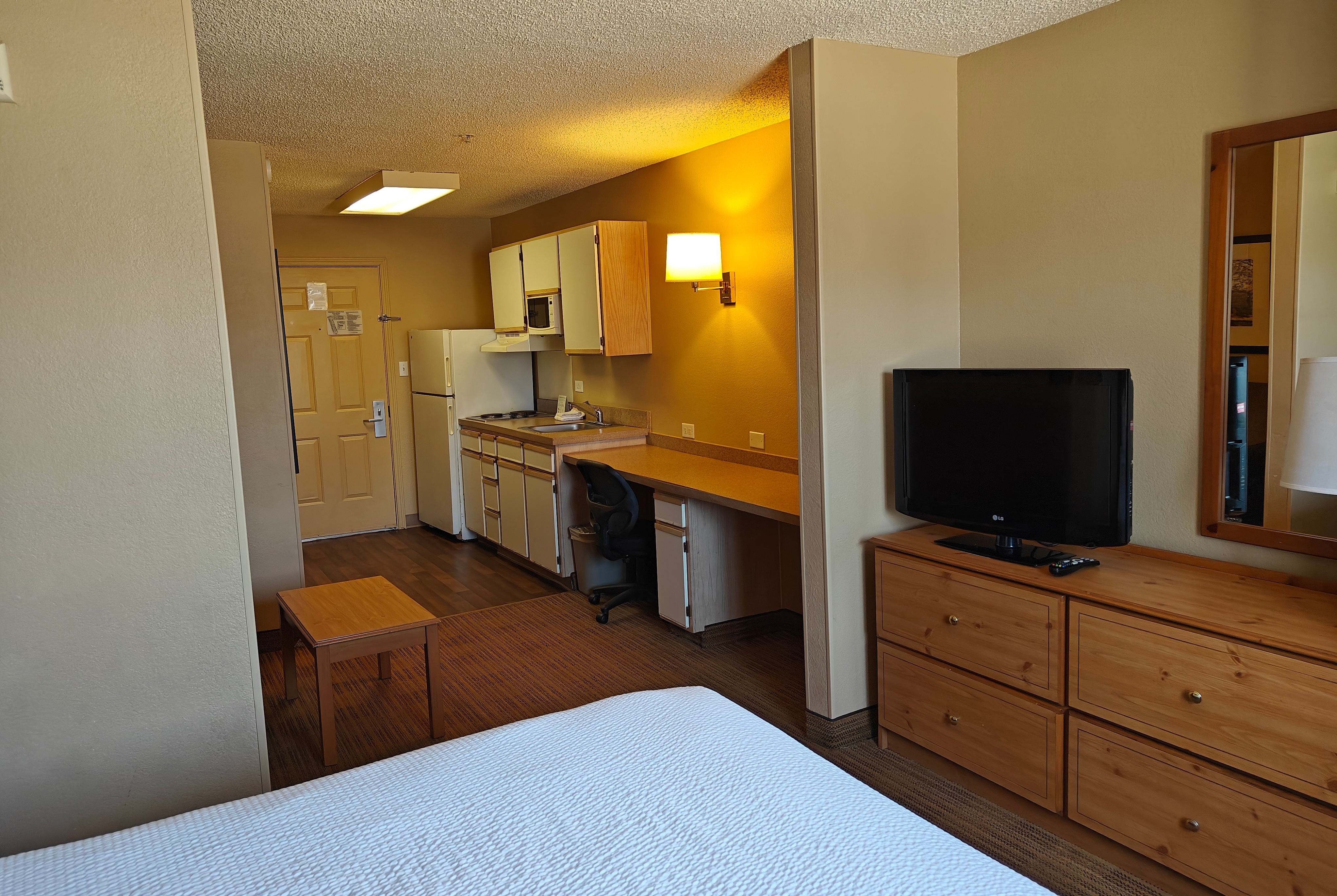 Guest room at the Hawthorn Extended Stay by Wyndham DFW Airport North in Irving, Texas