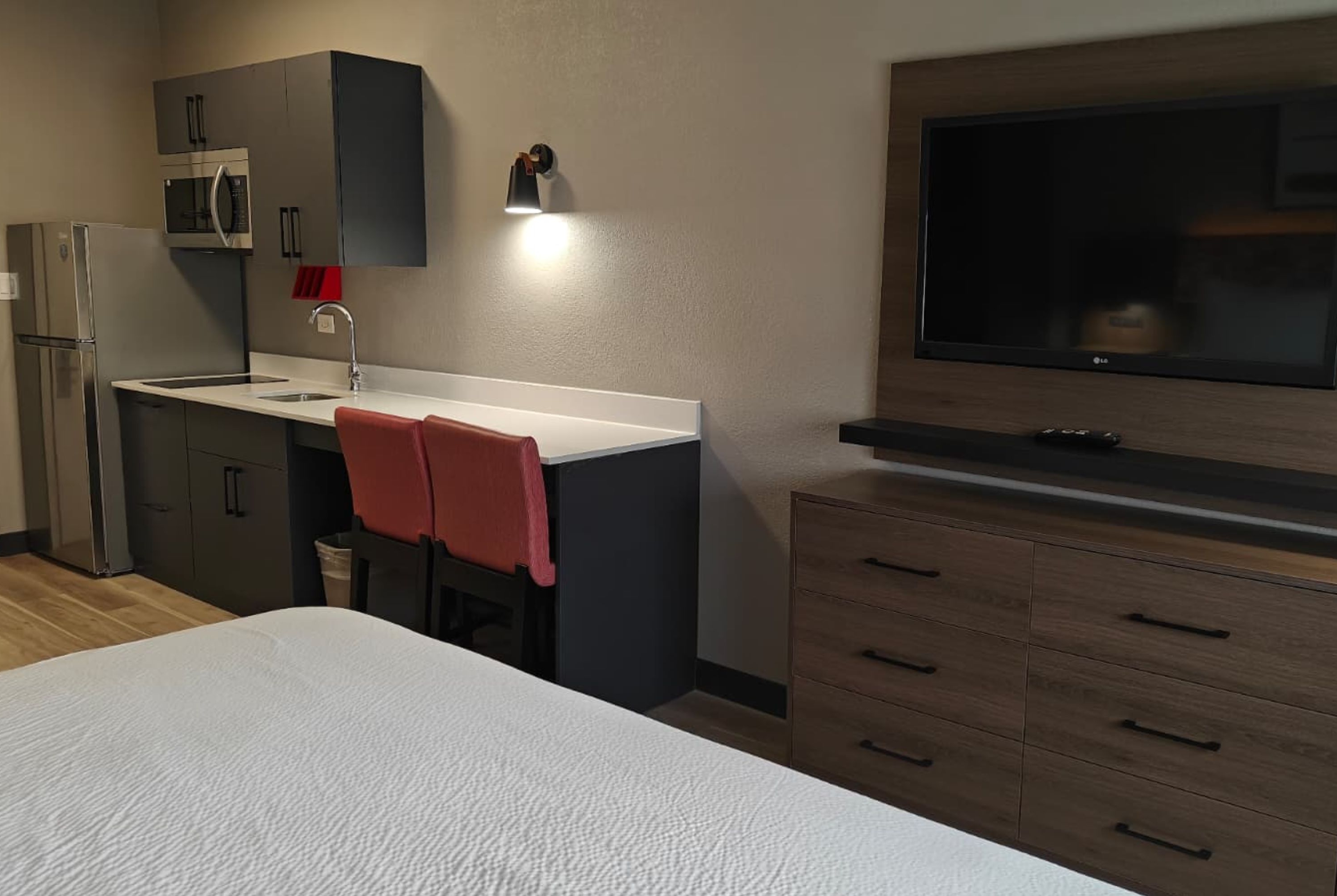 Guest room at the Hawthorn Extended Stay by Wyndham DFW Airport North in Irving, Texas