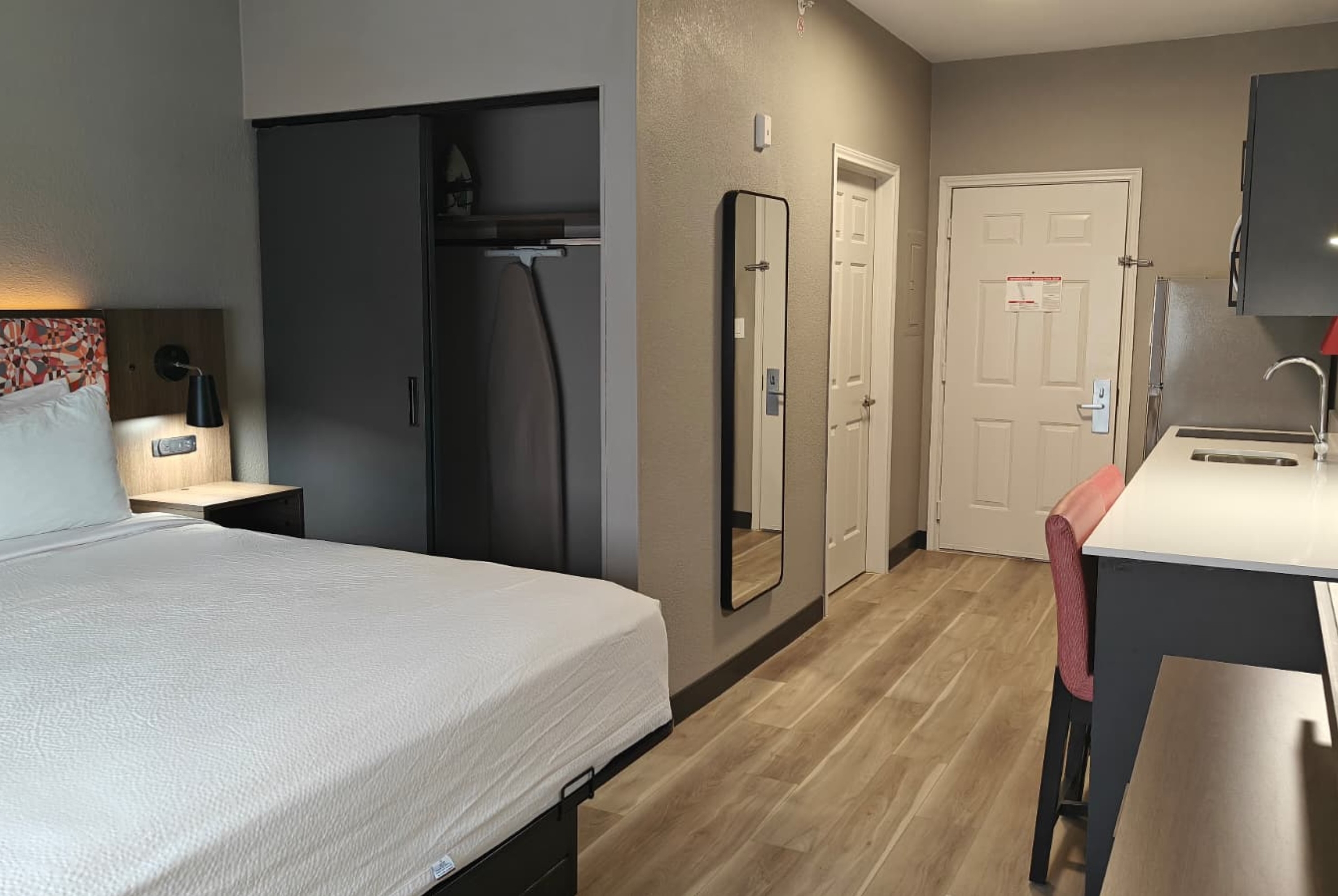 Guest room at the Hawthorn Extended Stay by Wyndham DFW Airport North in Irving, Texas