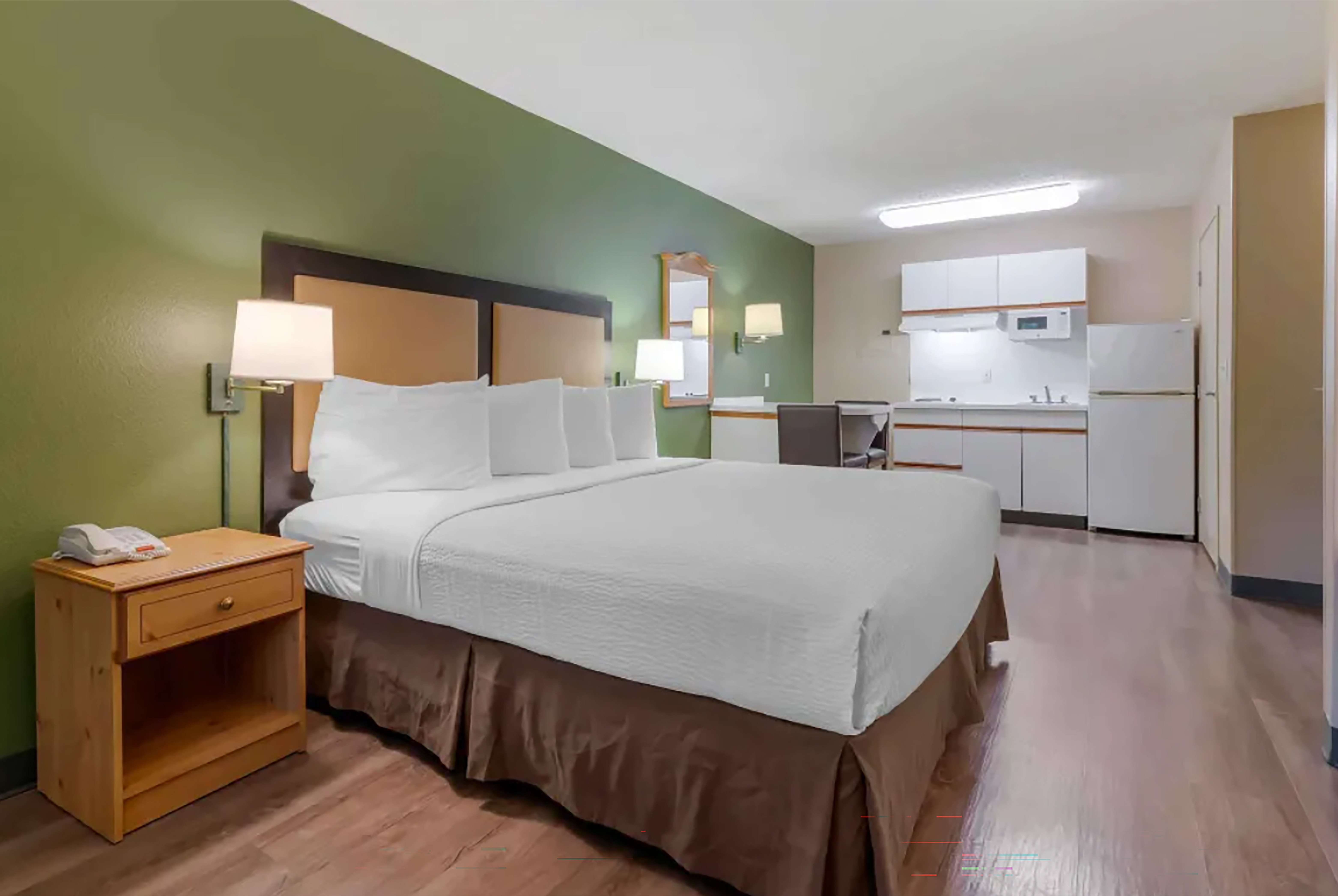 Guest room at the Hawthorn Extended Stay by Wyndham DFW Airport North in Irving, Texas