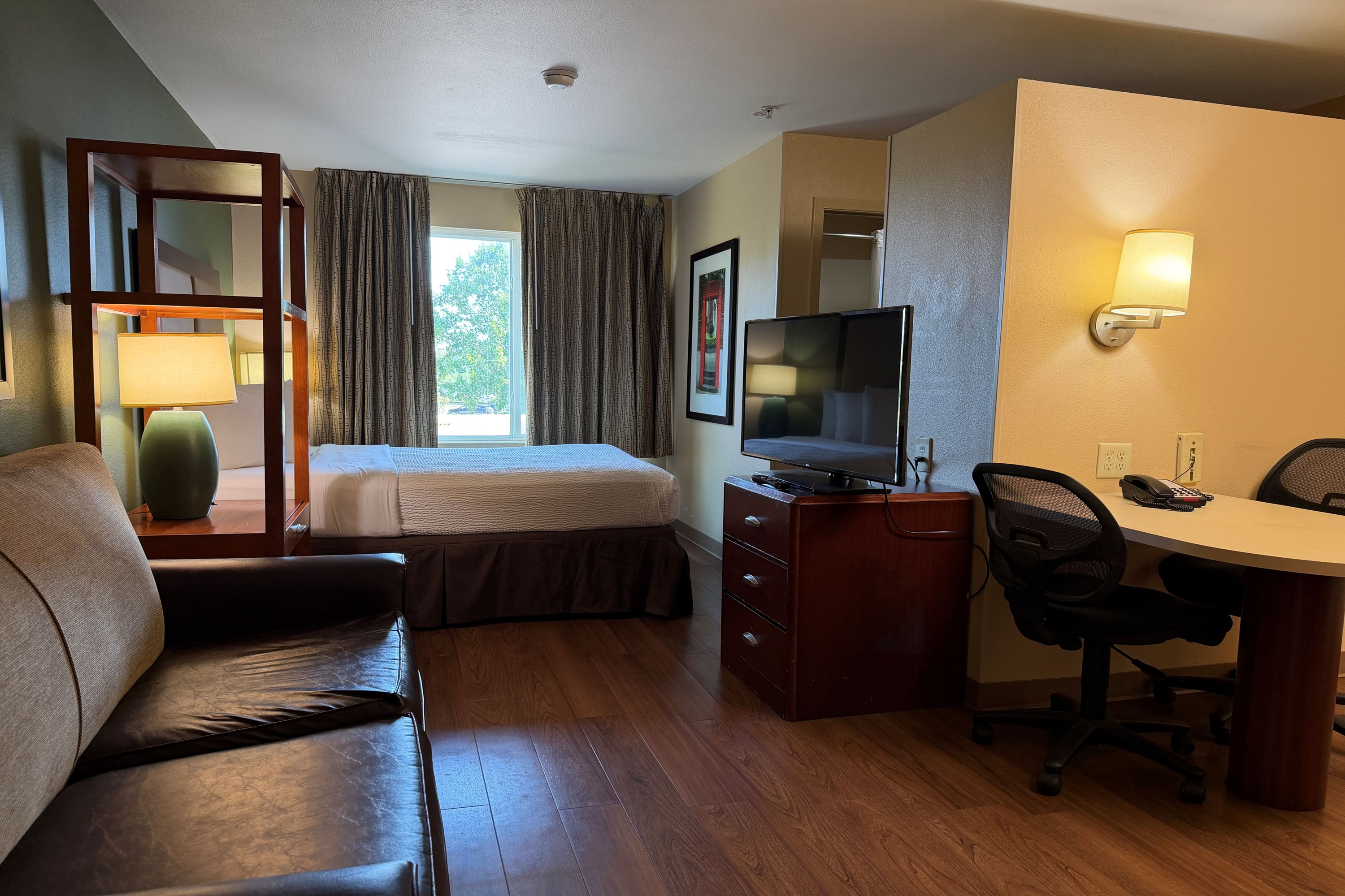 Guest room at the Hawthorn Extended Stay by Wyndham Irving Las Colinas in Irving, Texas