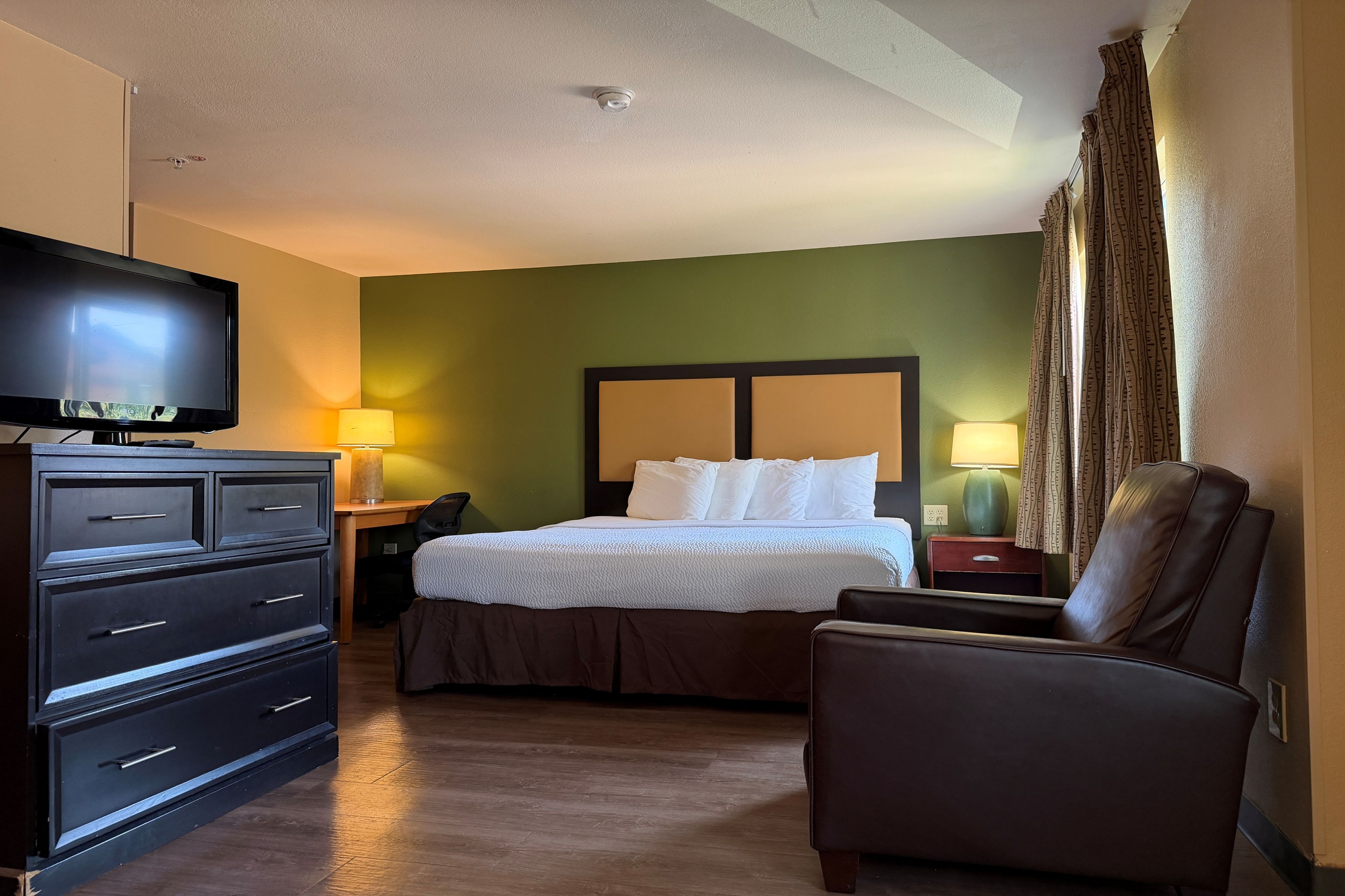 Guest room at the Hawthorn Extended Stay by Wyndham Irving Las Colinas in Irving, Texas