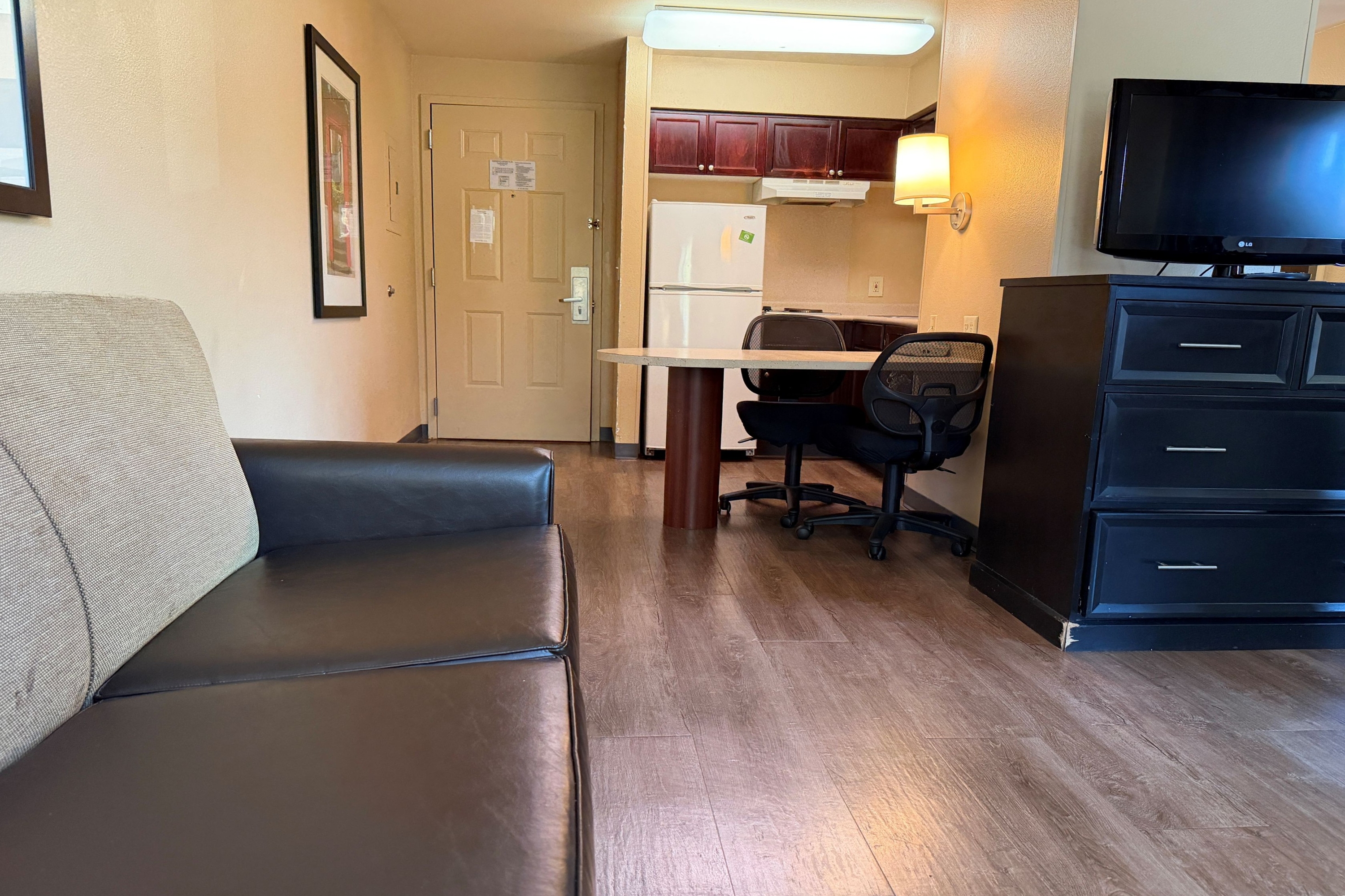 Guest room at the Hawthorn Extended Stay by Wyndham Irving Las Colinas in Irving, Texas