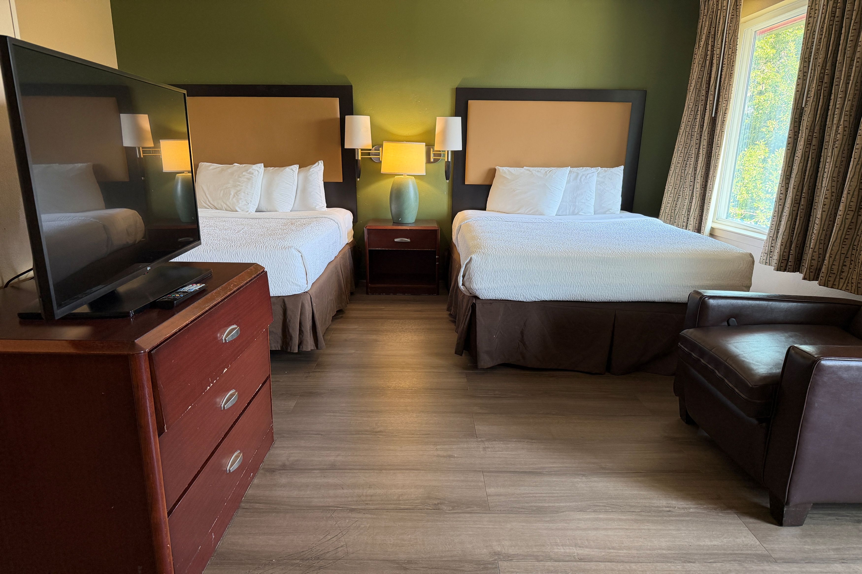 Guest room at the Hawthorn Extended Stay by Wyndham Irving Las Colinas in Irving, Texas