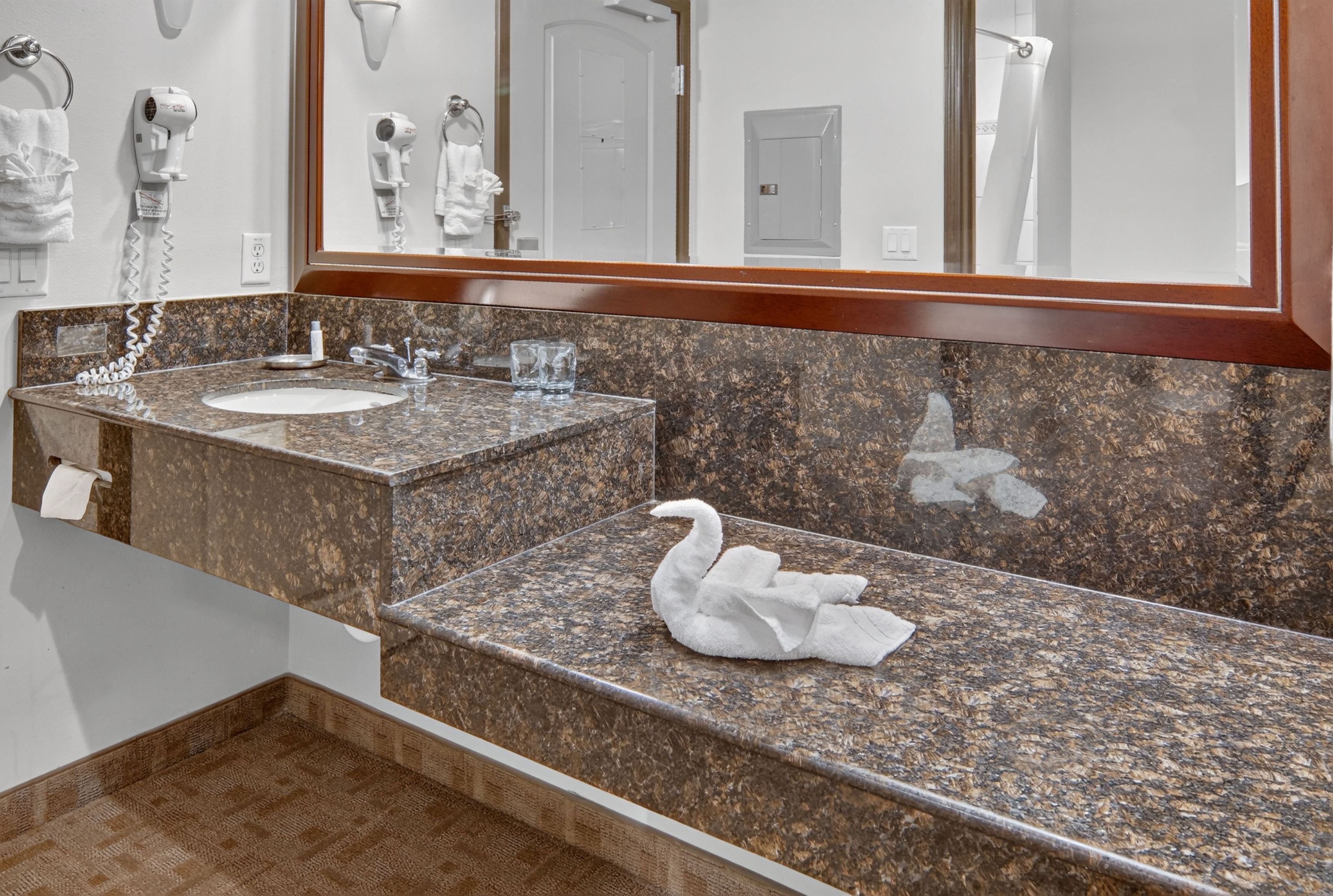 Guest room bath at the Hawthorn Extended Stay by Wyndham Killeen in Killeen, Texas