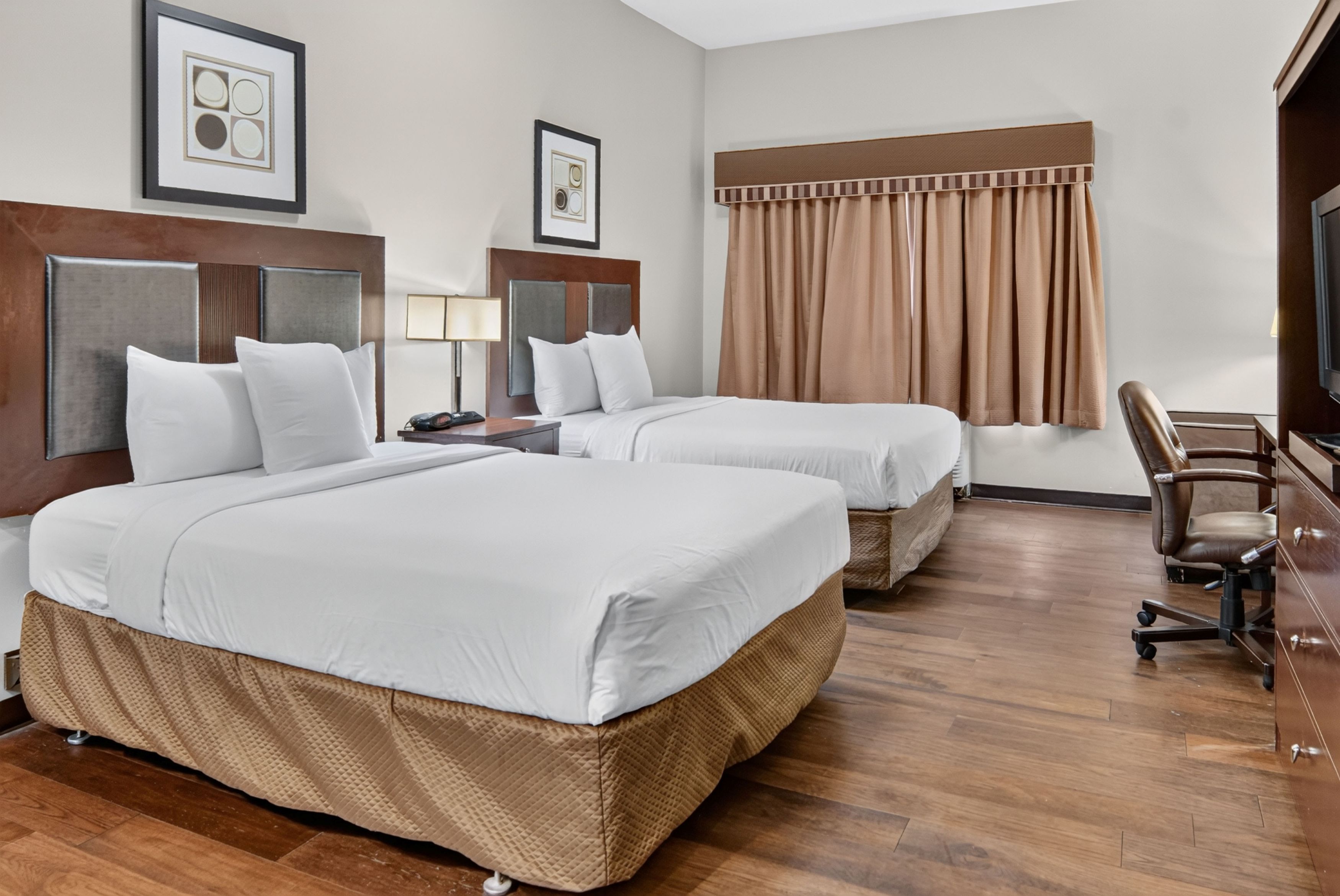 Guest room at the Hawthorn Extended Stay by Wyndham Killeen in Killeen, Texas