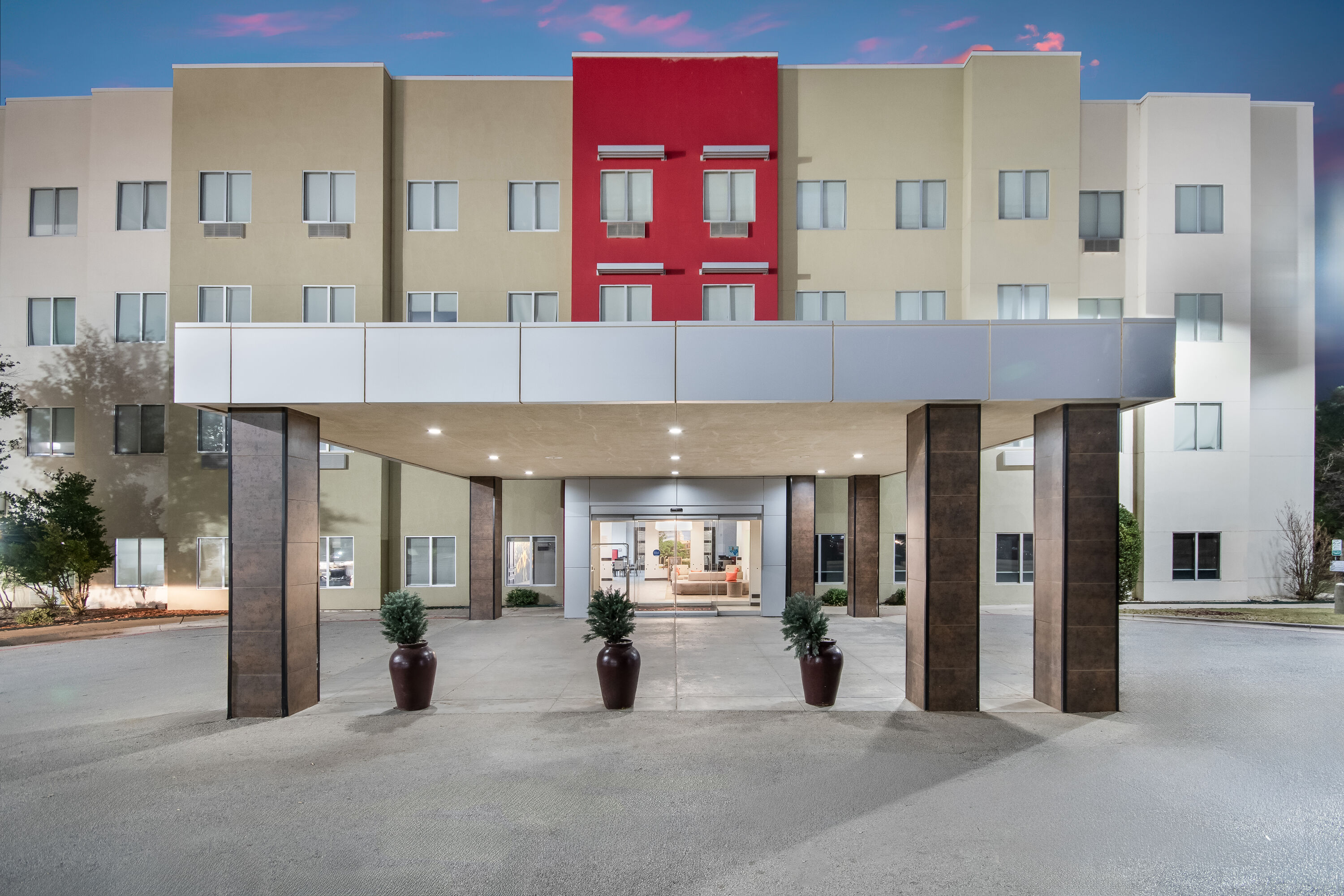 Exterior Dusk Image of Hawthorn Suites by Wyndham Lubbock hotel in Lubbock, Texas