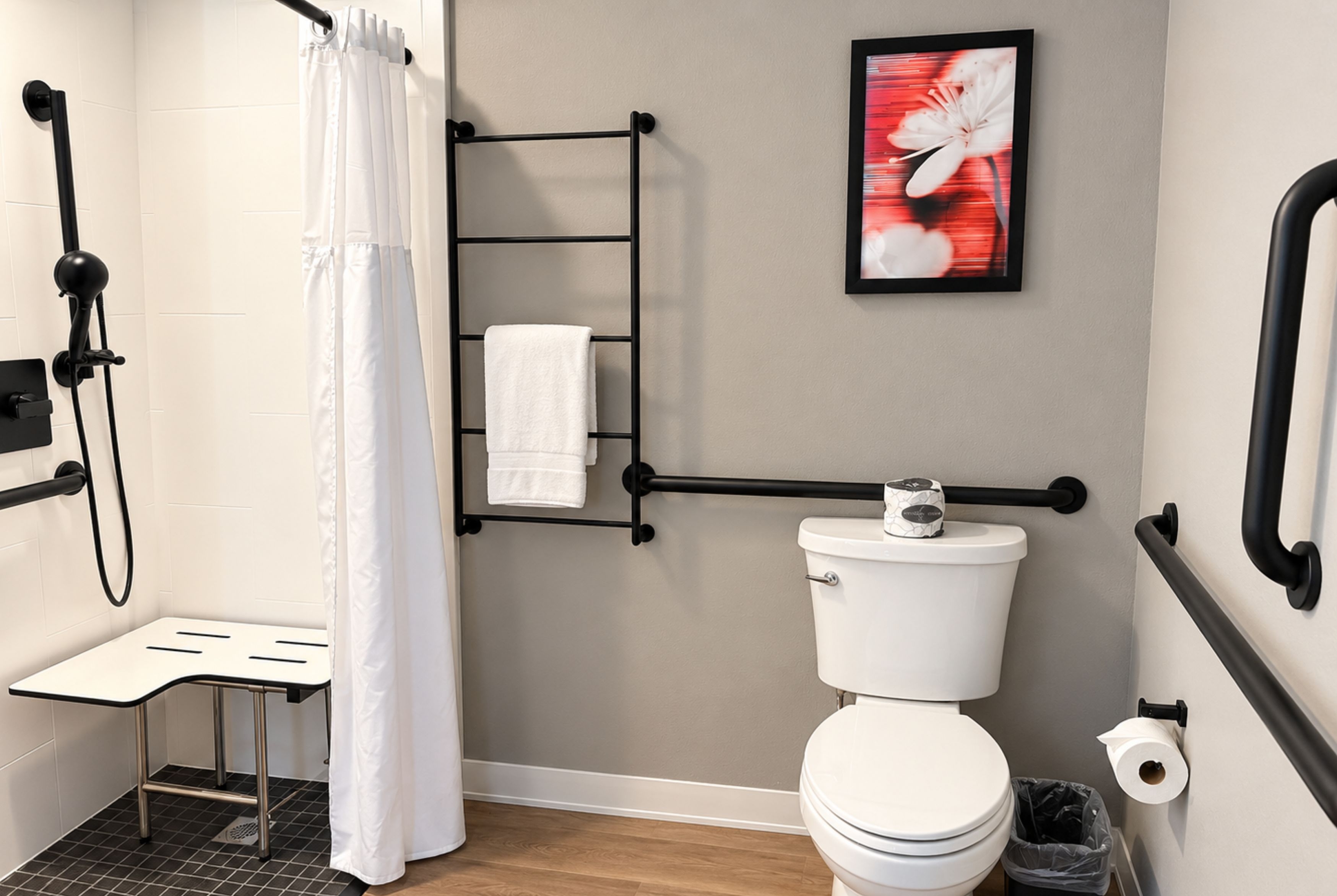 Guest room bath at the Hawthorn Extended Stay by Wyndham Central McKinney in McKinney, Texas