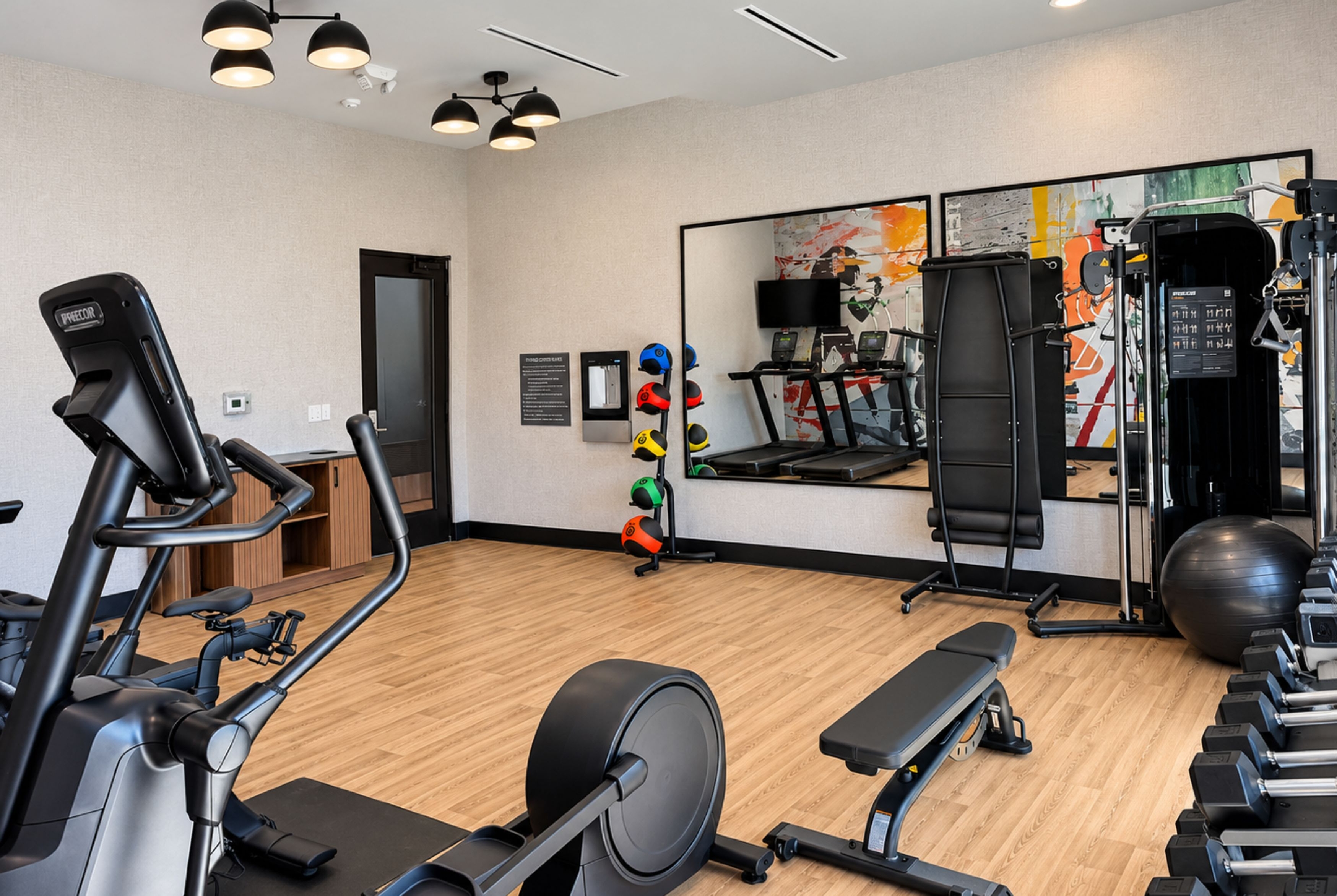 Fitness room at Hawthorn Extended Stay by Wyndham Central McKinney in McKinney, Texas