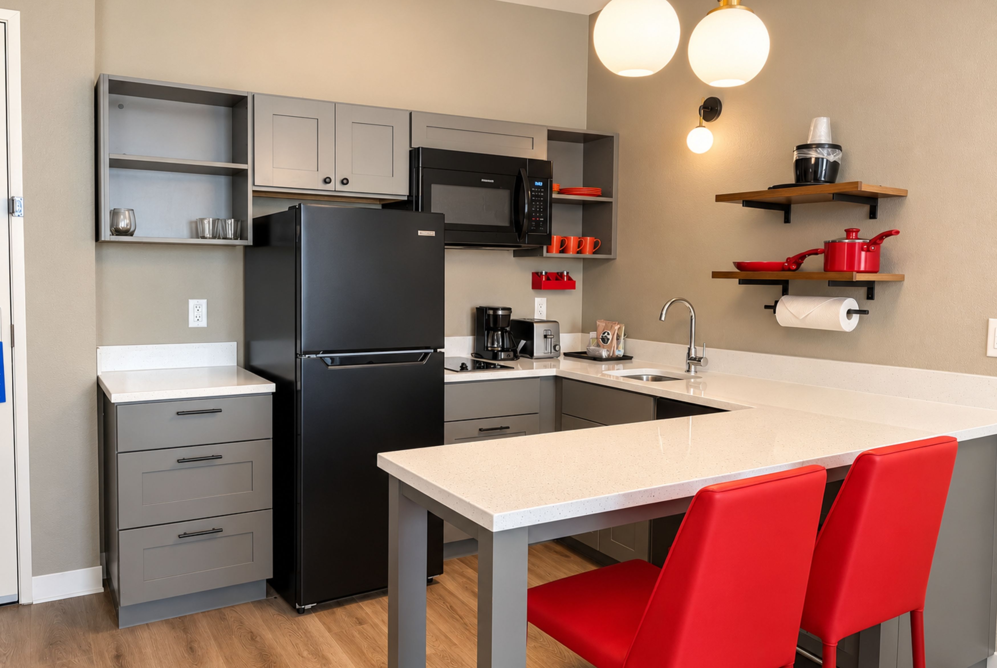 Guest room at the Hawthorn Extended Stay by Wyndham Central McKinney in McKinney, Texas