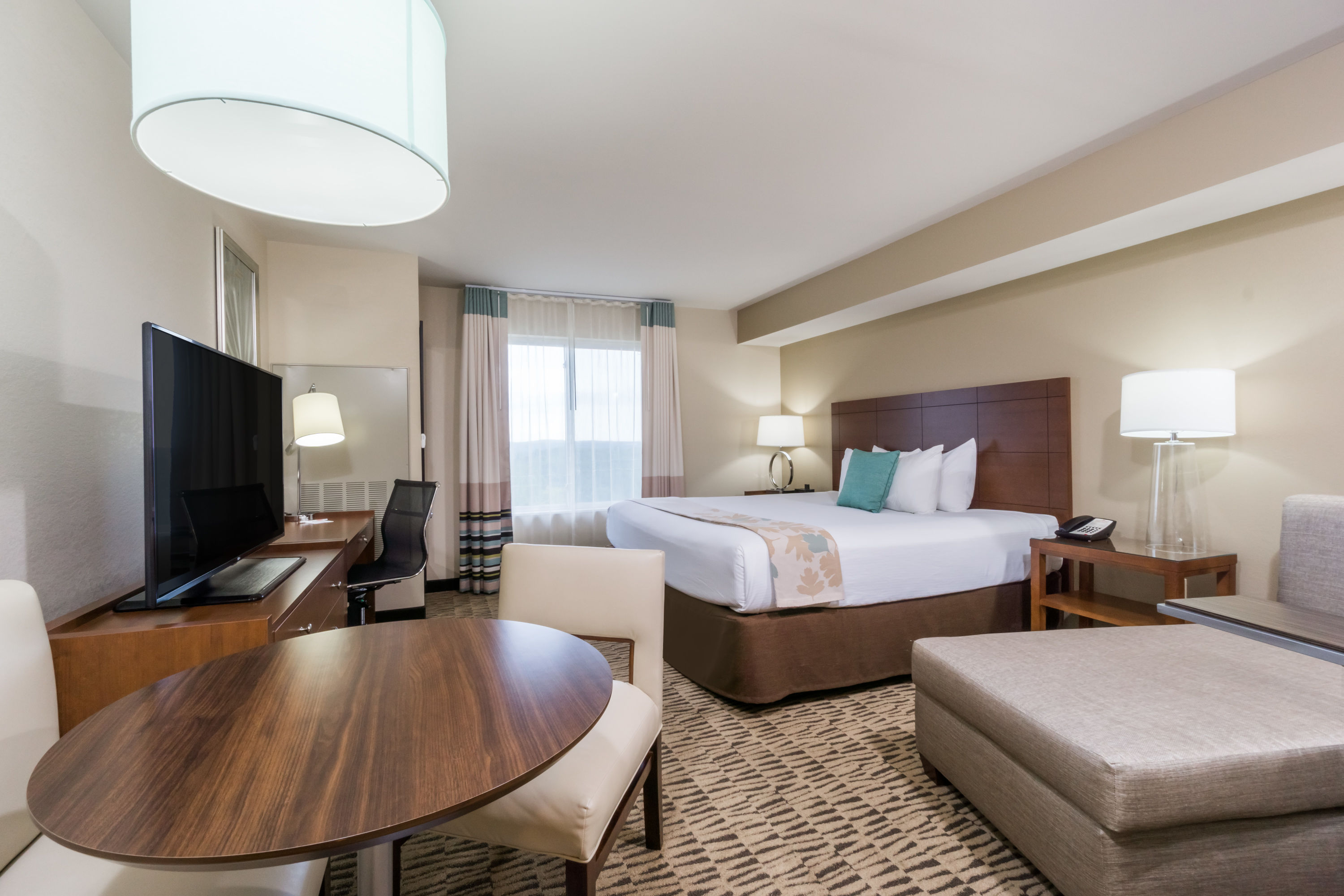 Guest room at the Hawthorn Suites by Wyndham Wheeling at the Highlands in Triadelphia, West Virginia