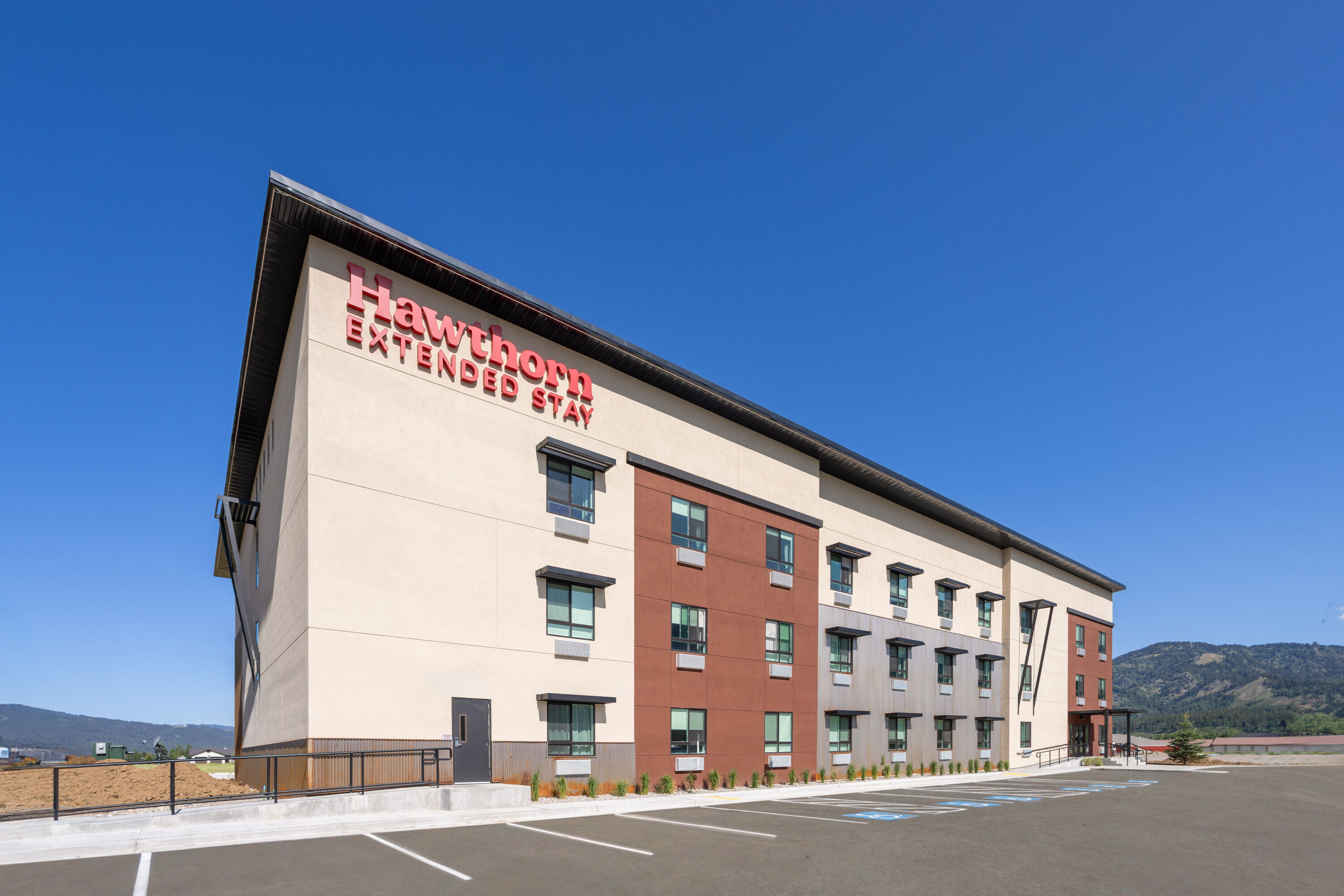 Exterior Day Image of Hawthorn Extended Stay by Wyndham Jackson Alpine hotel in Alpine, Wyoming