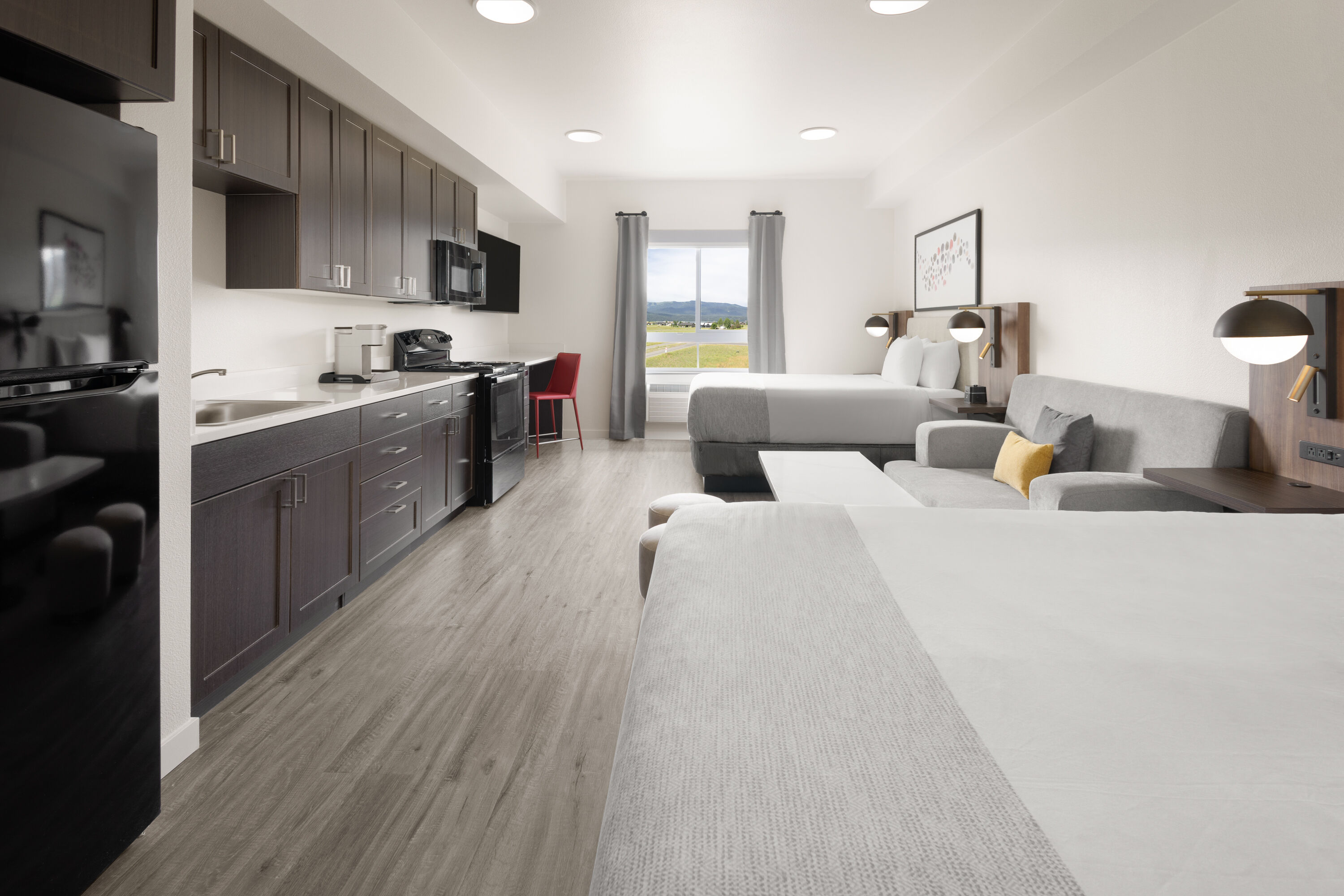 Guest room at the Hawthorn Extended Stay by Wyndham Jackson Alpine in Alpine, Wyoming