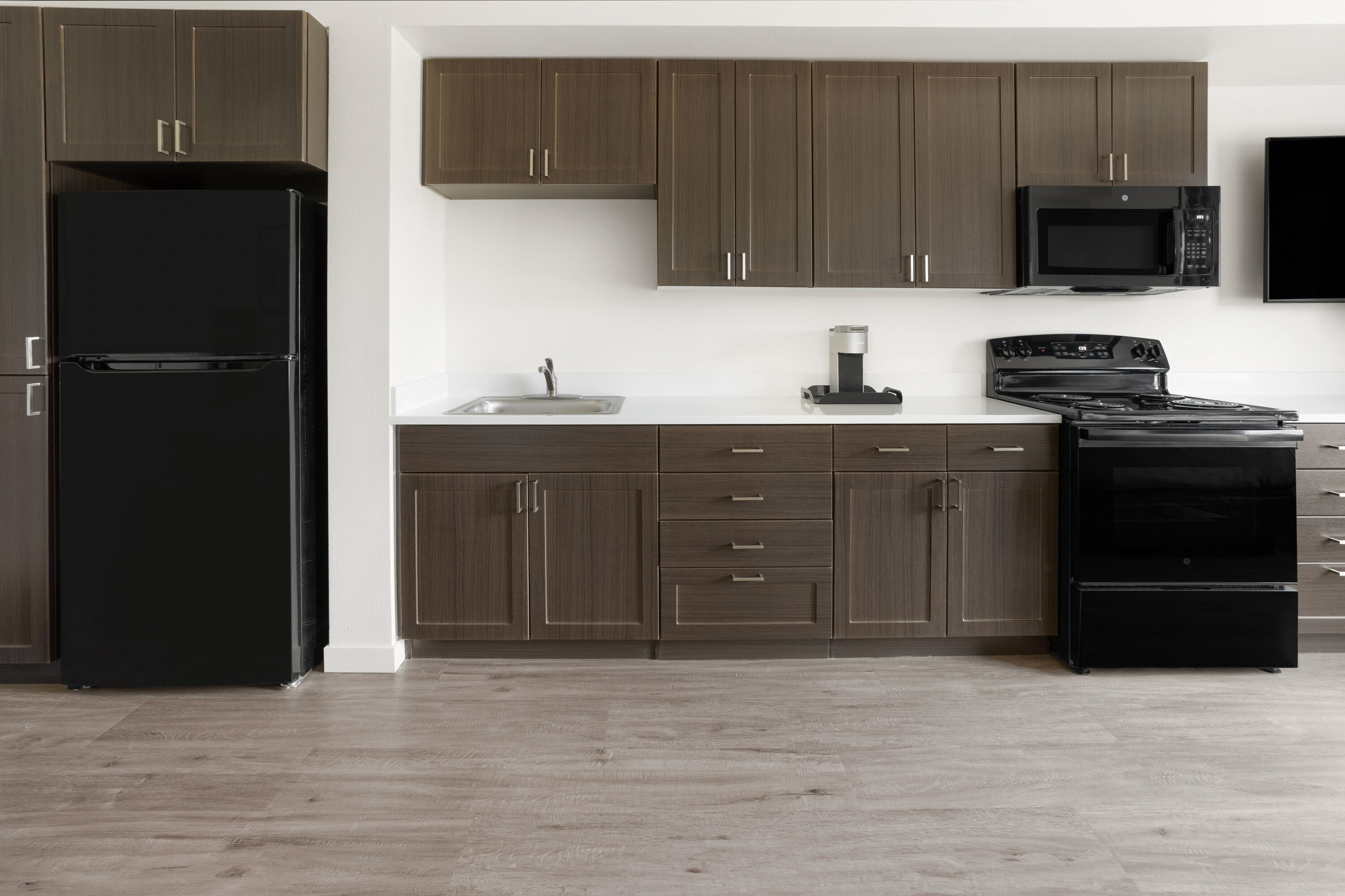 Guest room at the Hawthorn Extended Stay by Wyndham Jackson Alpine in Alpine, Wyoming