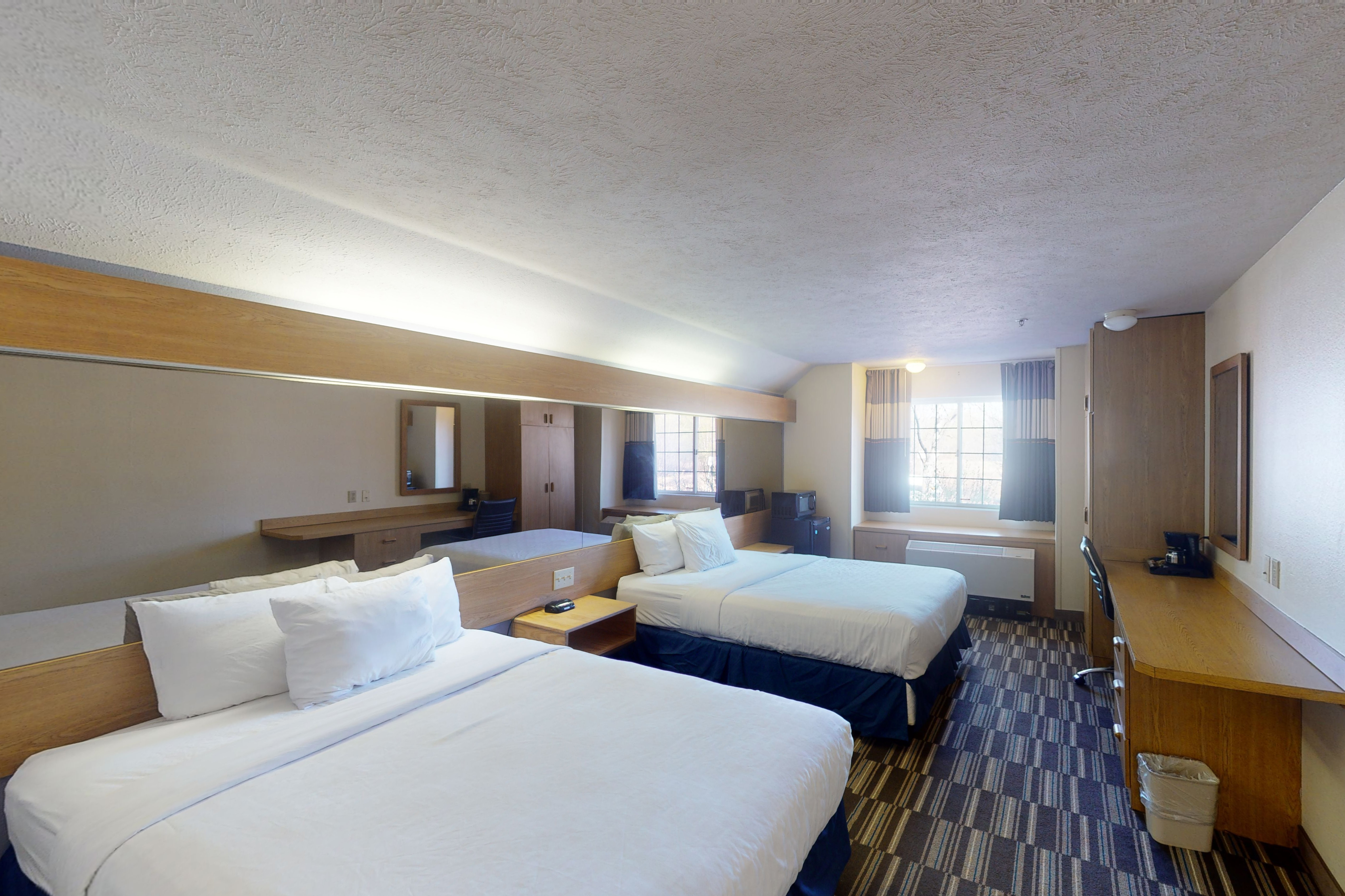 Guest room at the Baymont Inn & Suites by Wyndham Anchorage Airport in Anchorage, Alaska