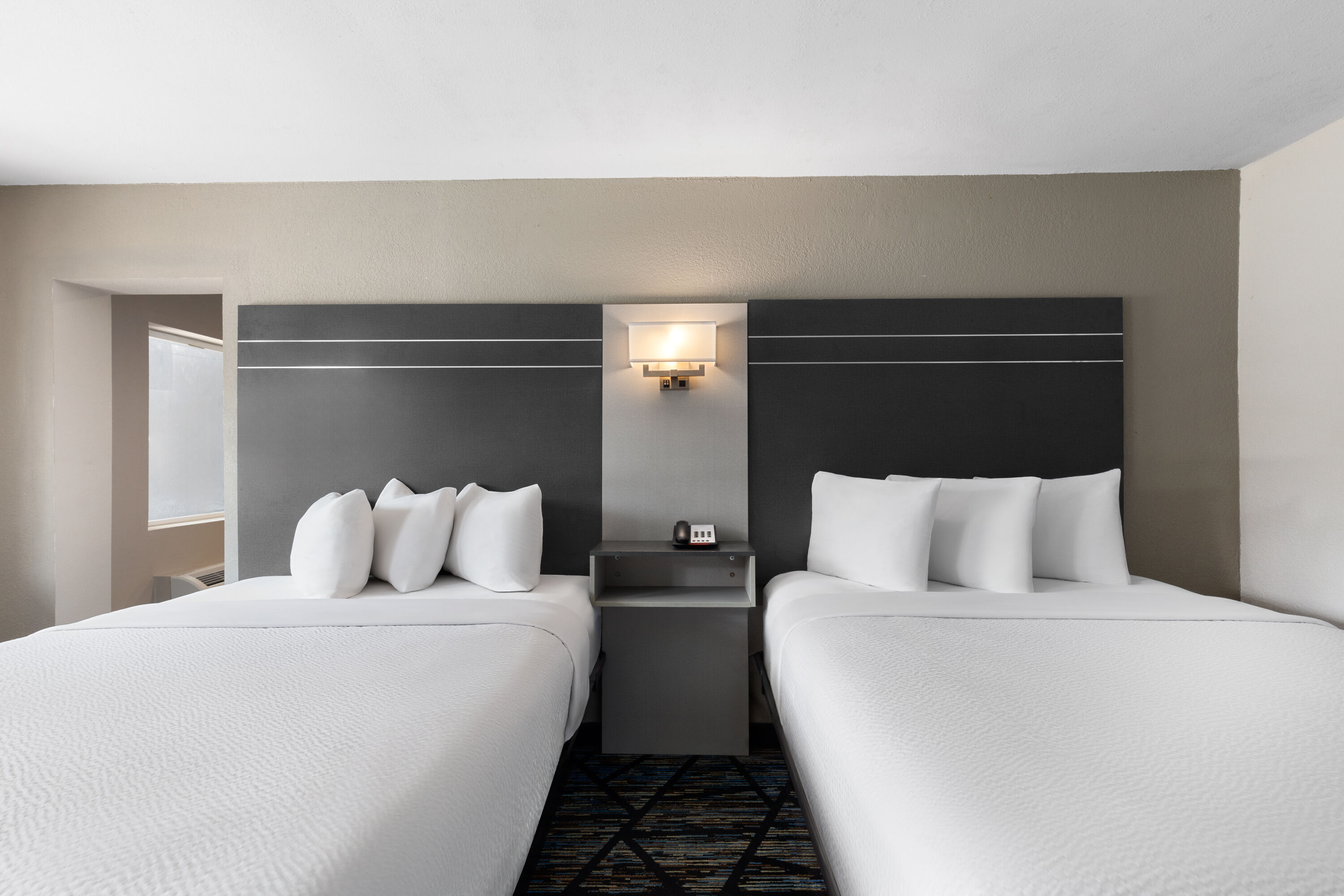 Guest room at the Baymont by Wyndham Dothan in Dothan, Alabama