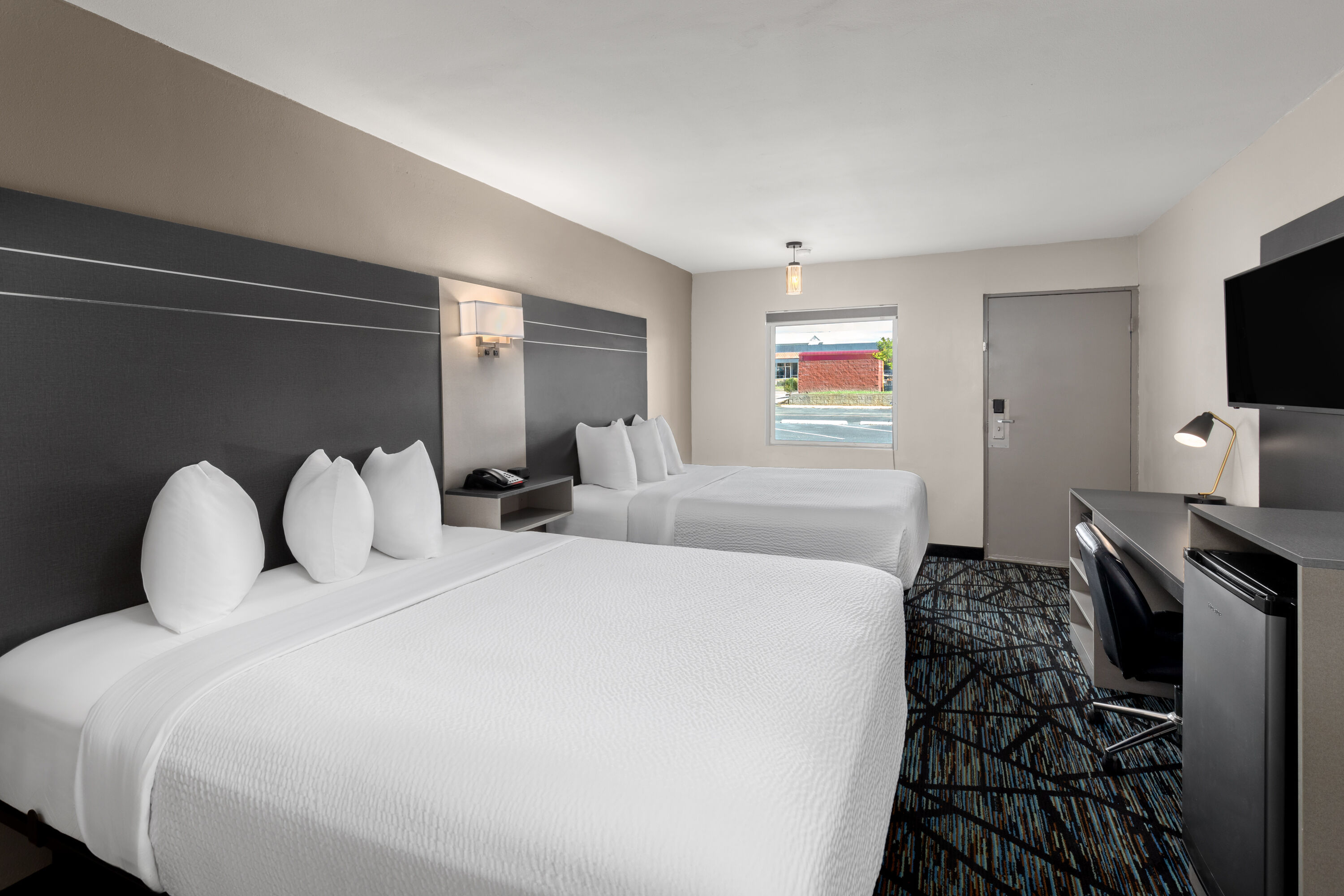 Guest room at the Baymont by Wyndham Dothan in Dothan, Alabama