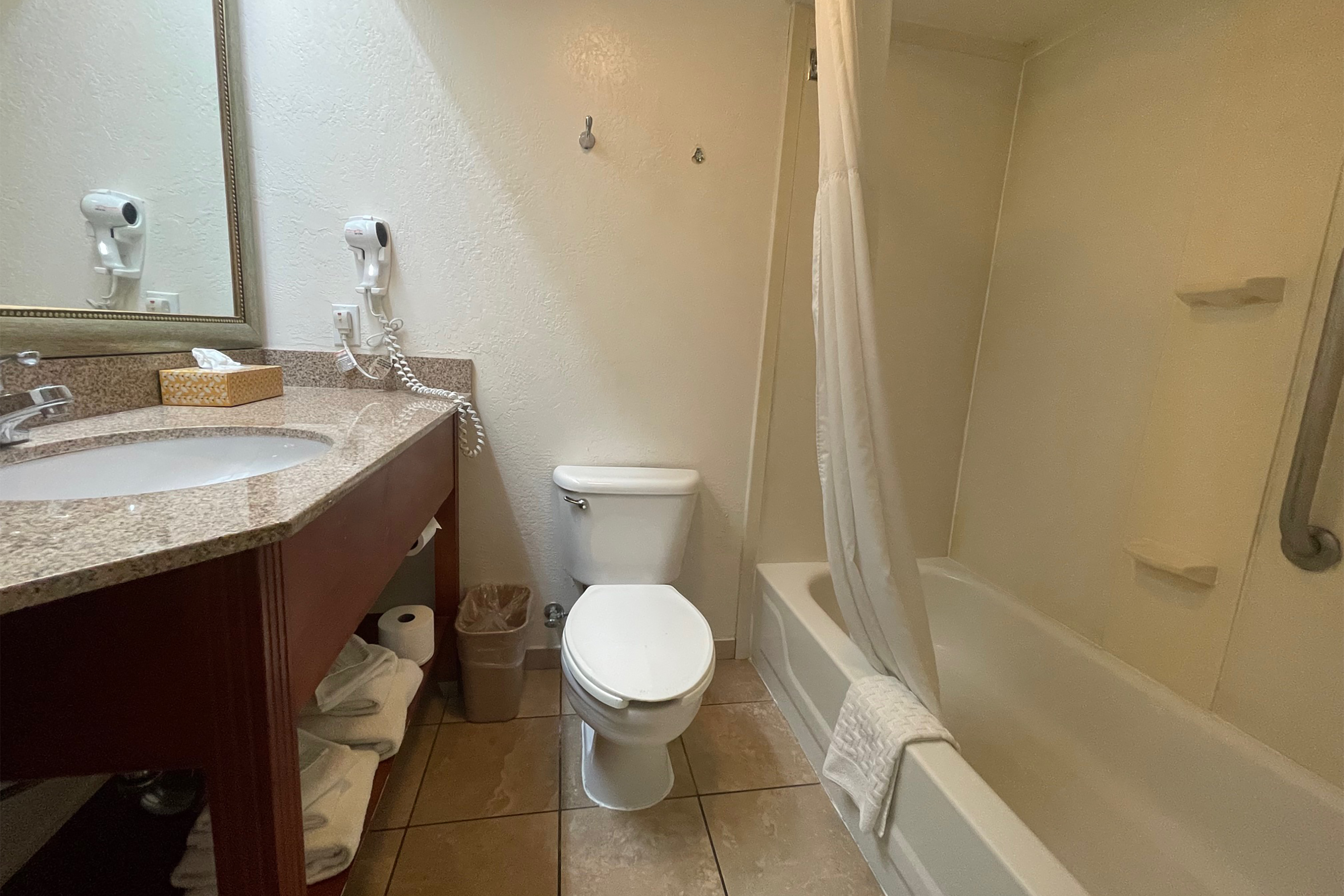 Guest room bath at the Baymont Inn & Suites by Wyndham Tempe University/Phoenix in Tempe, Arizona