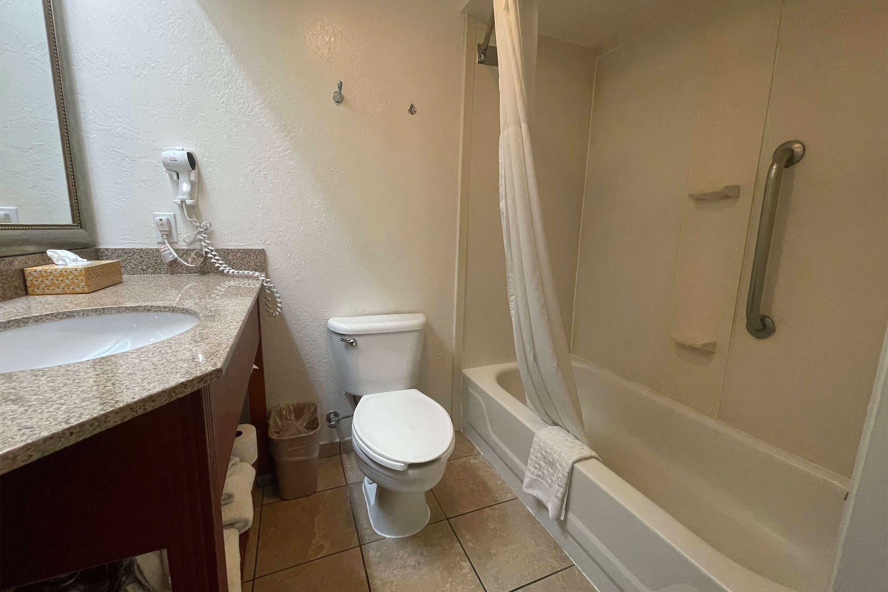 Guest room bath at the Baymont Inn & Suites by Wyndham Tempe University/Phoenix in Tempe, Arizona