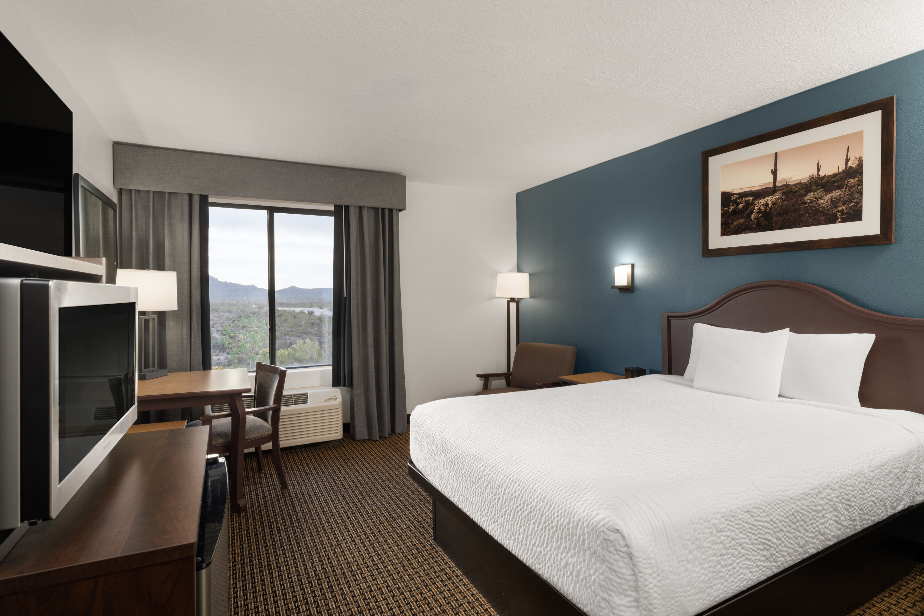 Guest room at the Tombstone Grand Hotel, a Baymont by Wyndham in Tombstone, Arizona