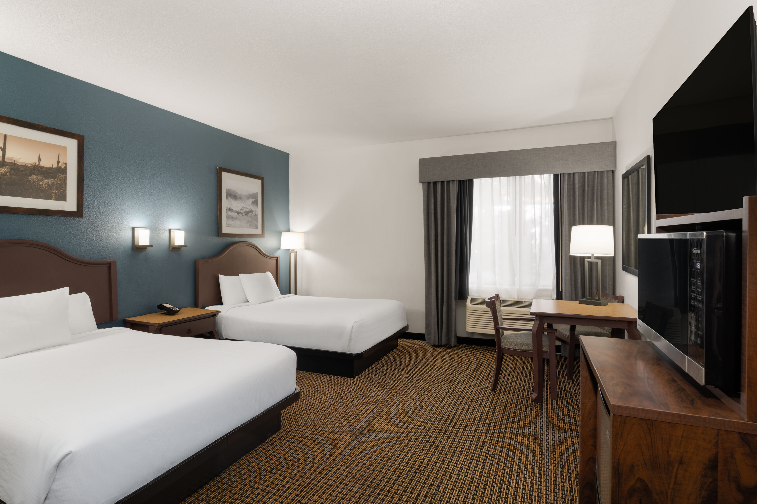 Guest room at the Tombstone Grand Hotel, a Baymont by Wyndham in Tombstone, Arizona