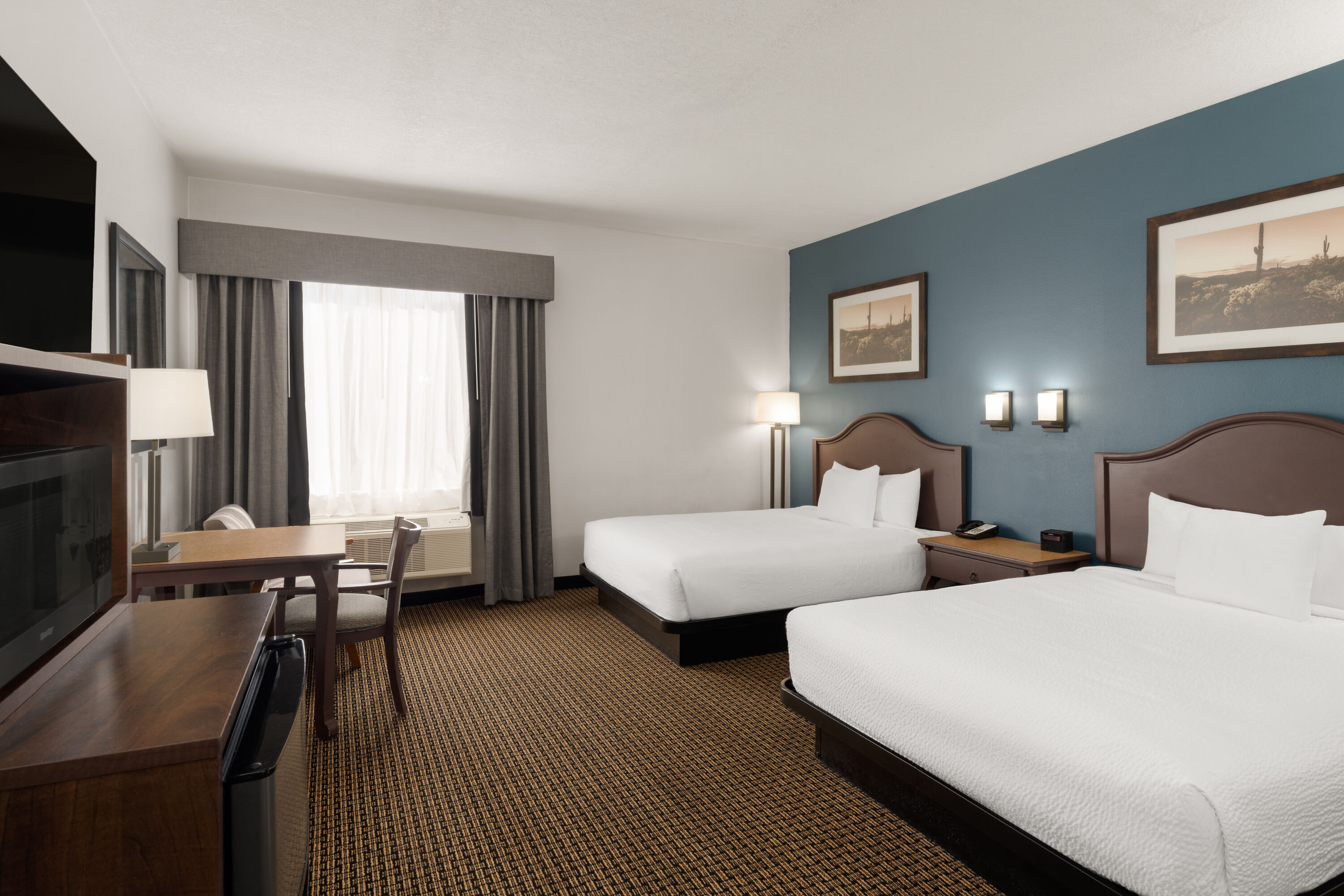 Guest room at the Tombstone Grand Hotel, a Baymont by Wyndham in Tombstone, Arizona