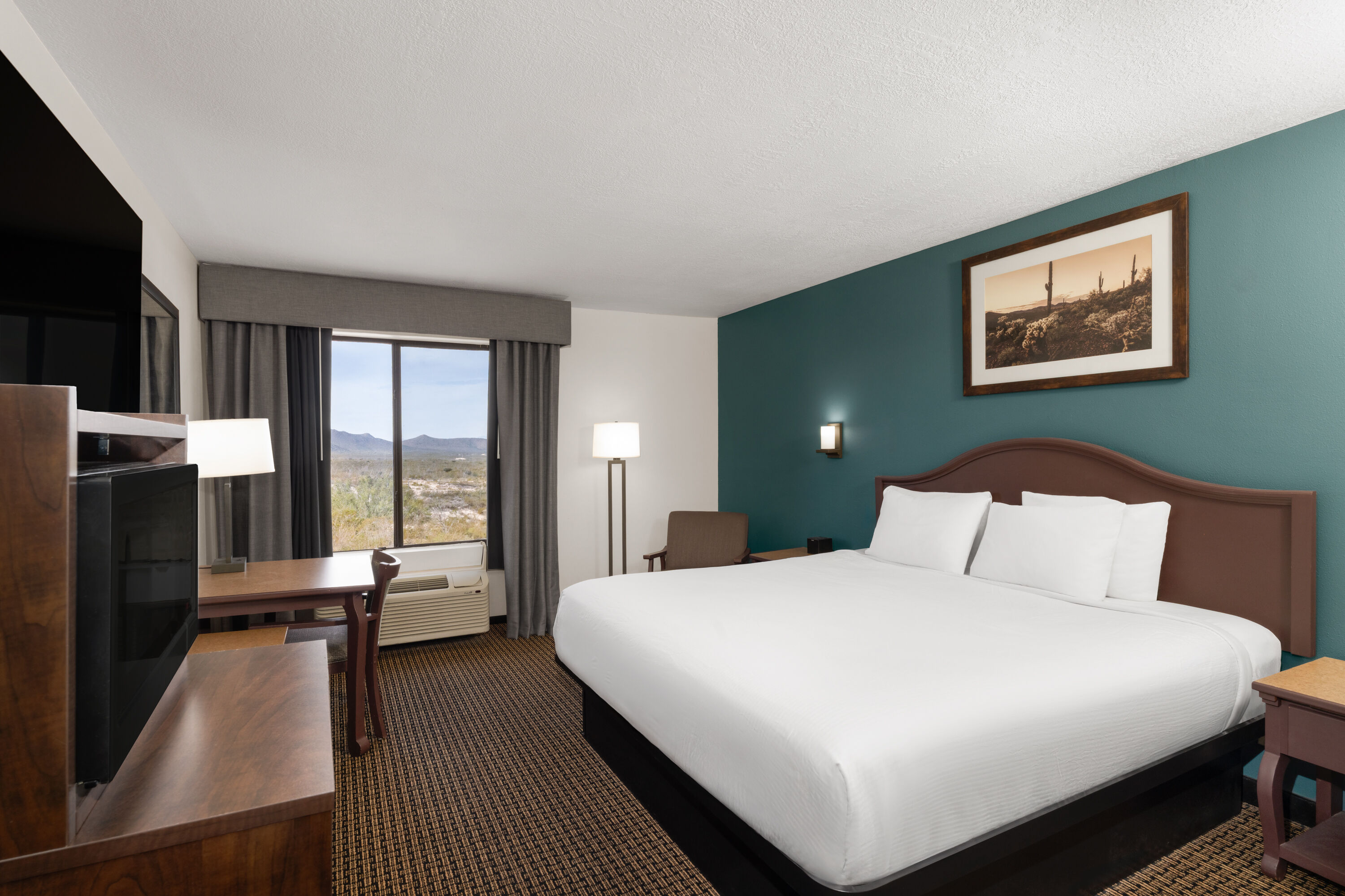 Guest room at the Tombstone Grand Hotel, a Baymont by Wyndham in Tombstone, Arizona