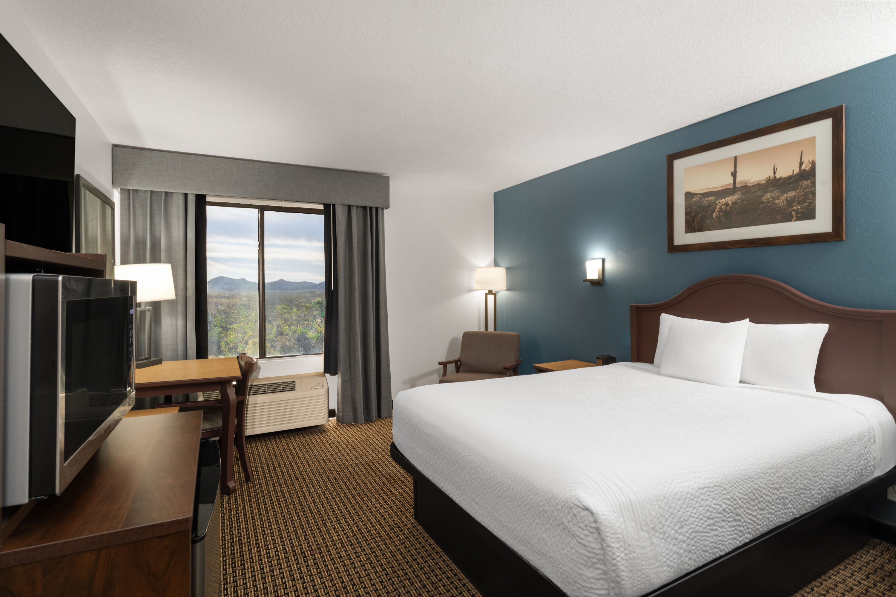 Guest room at the Tombstone Grand Hotel, a Baymont by Wyndham in Tombstone, Arizona
