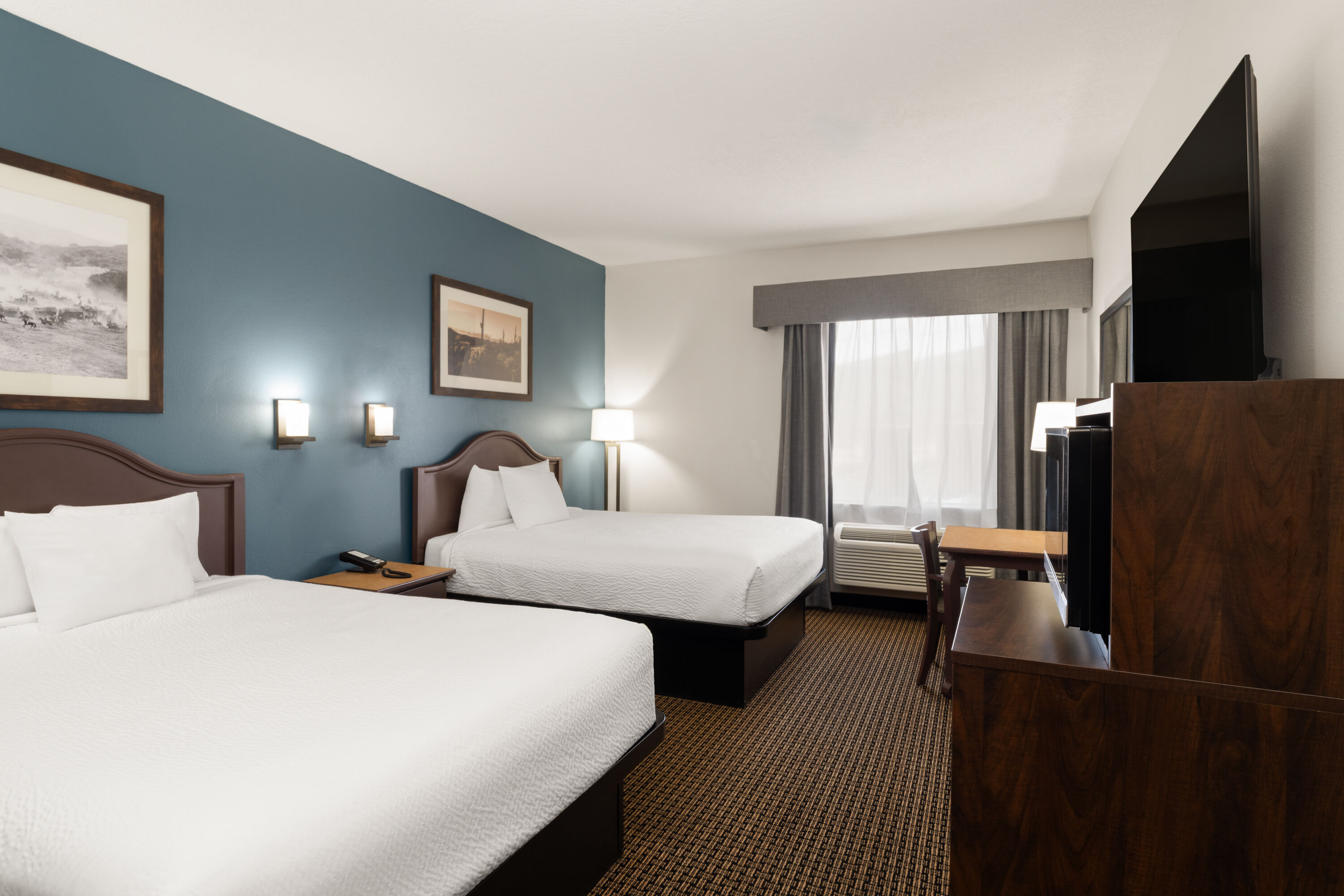 Guest room at the Tombstone Grand Hotel, a Baymont by Wyndham in Tombstone, Arizona