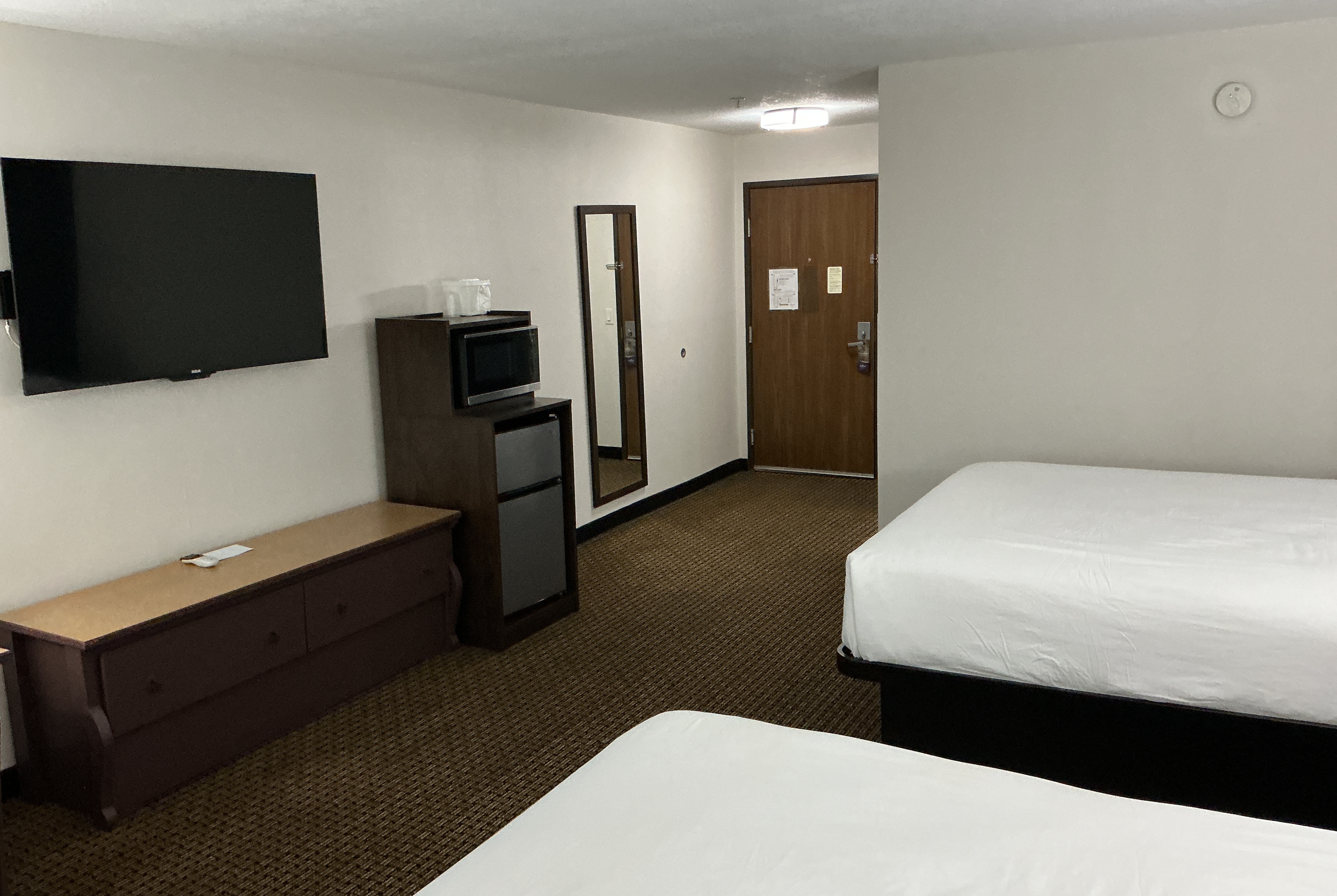 Guest room at the Tombstone Grand Hotel, a Baymont by Wyndham in Tombstone, Arizona
