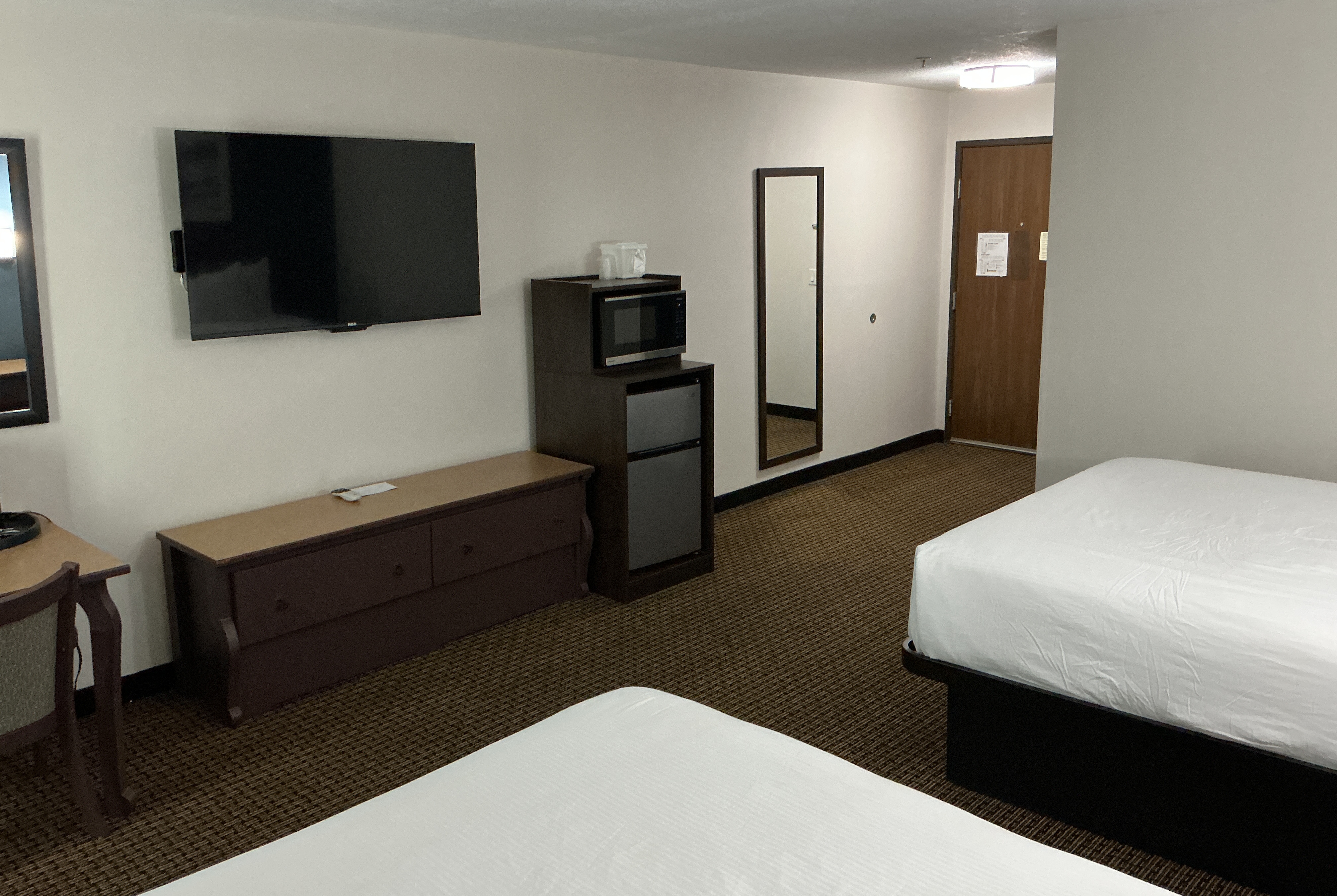 Guest room at the Tombstone Grand Hotel, a Baymont by Wyndham in Tombstone, Arizona