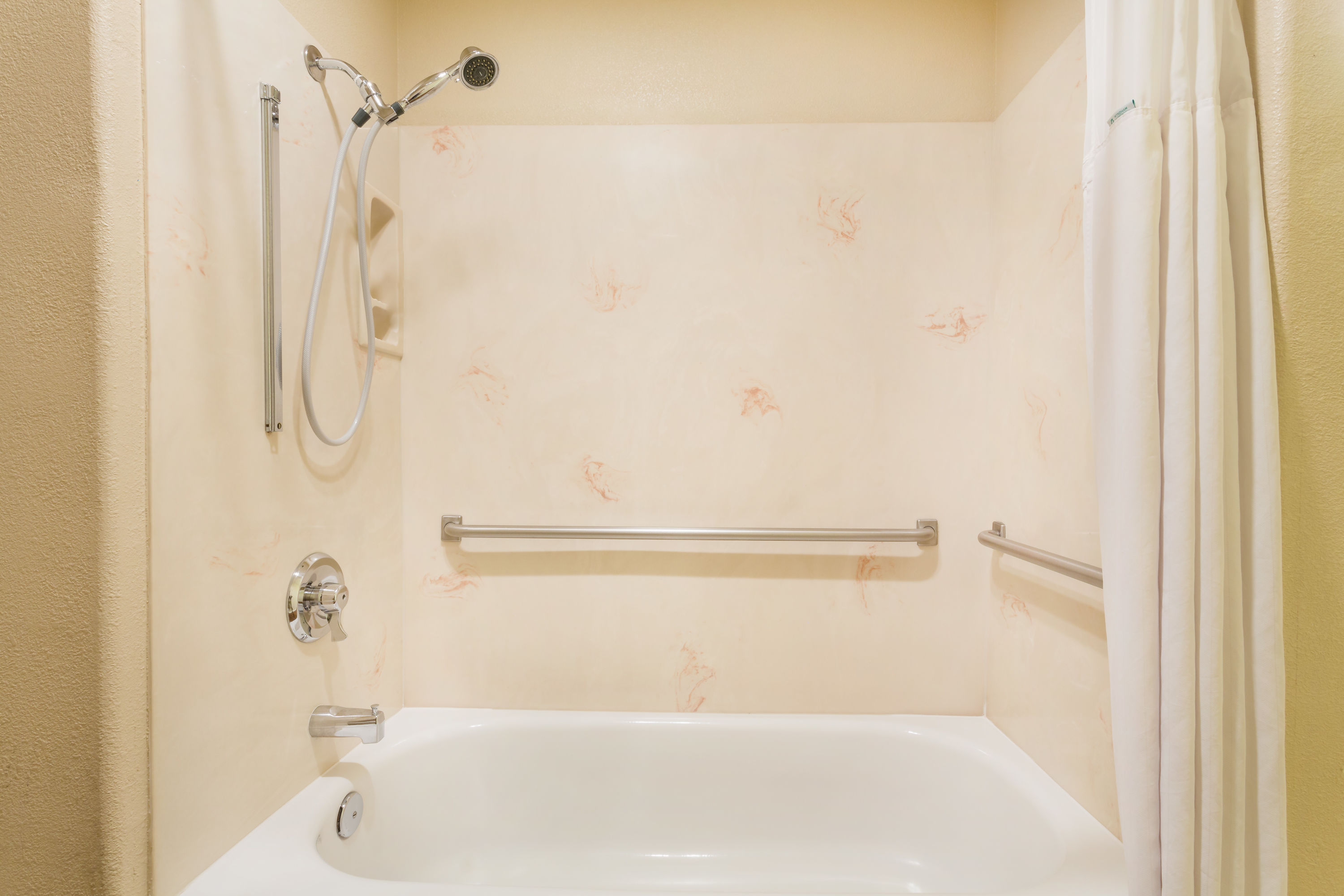 Guest room bath at the Baymont by Wyndham Modesto Salida in Modesto, California